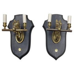 Pair of 1950's Stitched leather sconces by Jacques Adnet