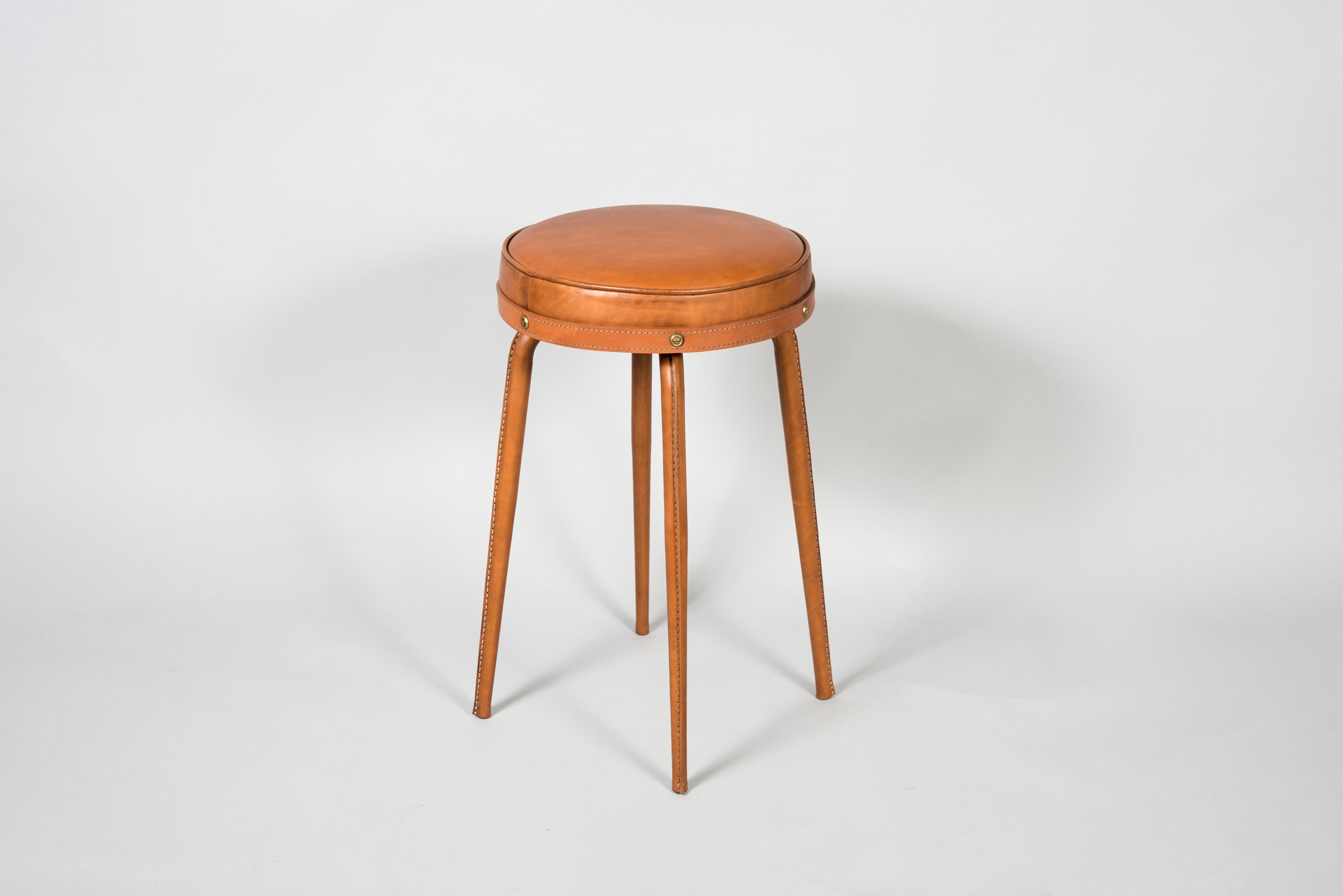 1950's Stitched leather stools designed by Jacques Adnet
France.