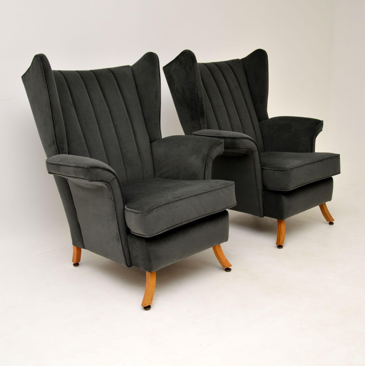 Mid-Century Modern Pair of 1950's Velvet Wing Back Armchairs For Sale