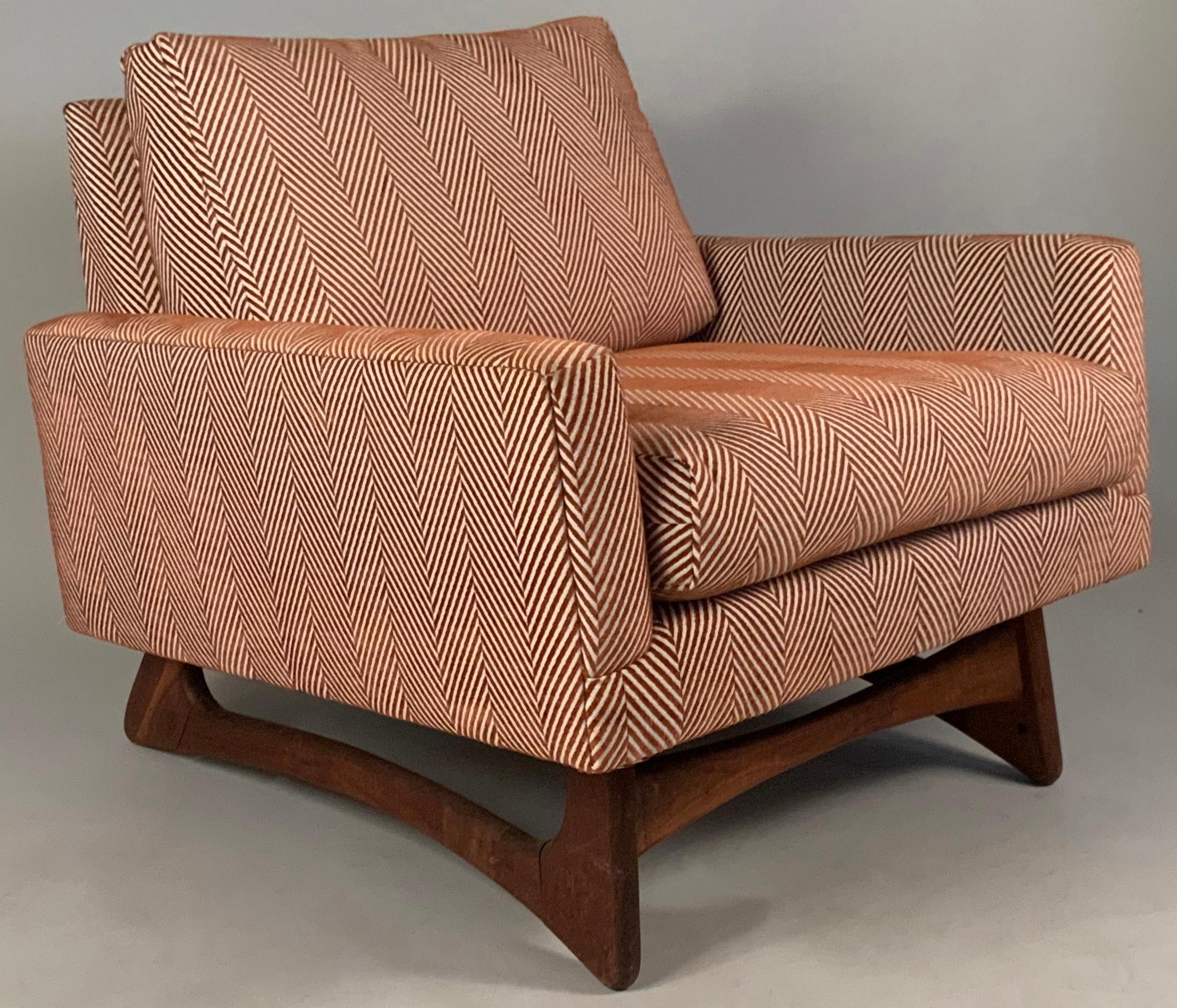 a very handsome pair of vintage 1950's lounge chairs designed by Adrian Pearsall for Craft Associates. these very comfortable chairs have sculpted walnut bases in Pearsall's signature design, and have just been reupholstered in a very nice red and