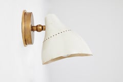 Pair of 1950s White Perforated Metal & Brass Sconces by Stilnovo