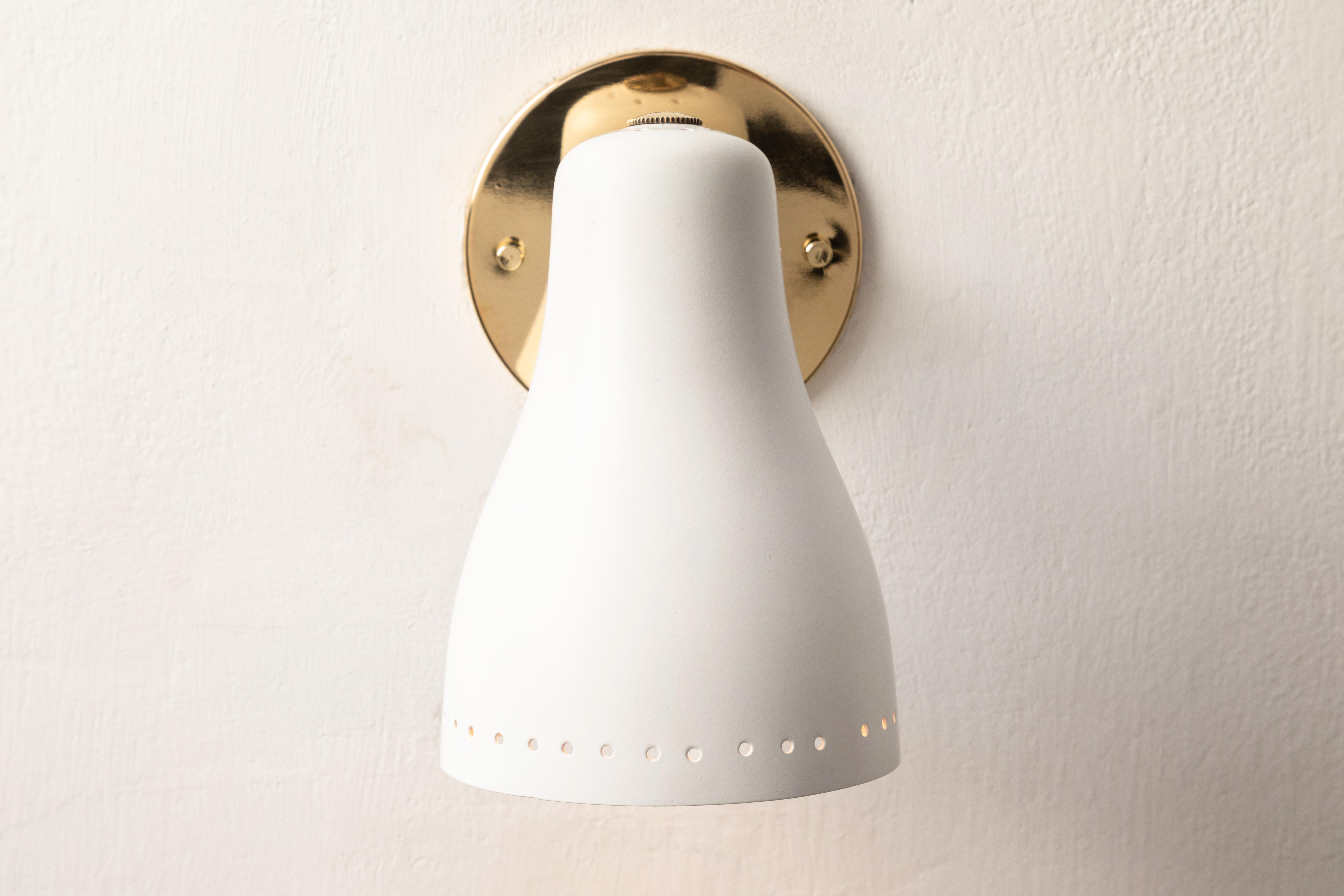 Mid-20th Century Pair of 1950s White Perforated Sconces Attributed to Jacques Biny