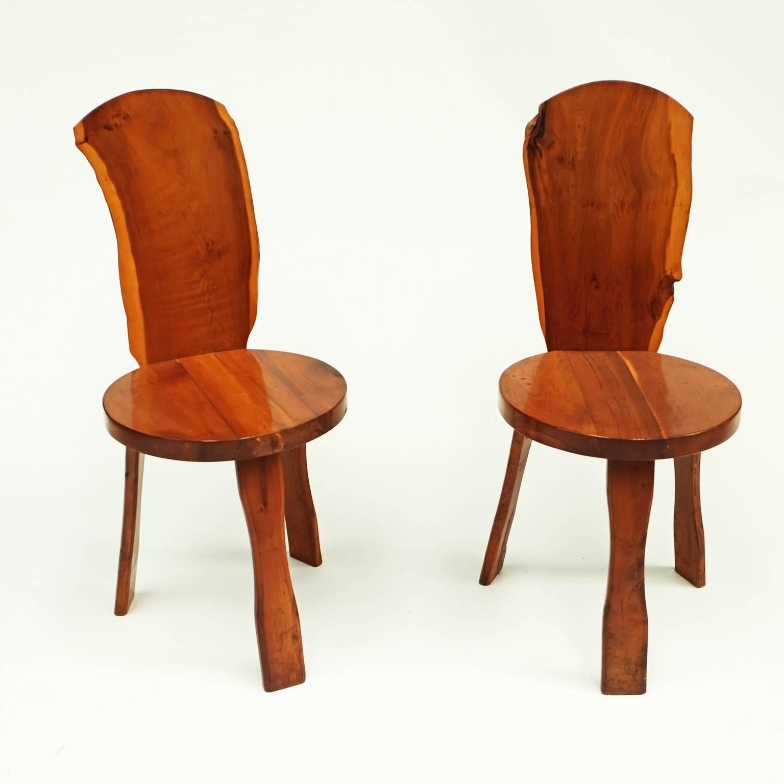 Rare 1950s yew wood chairs designed by Garth Reynolds for Reynolds of Ludlow, UK. Stamped to the base.

Reynolds of Ludlow was a British artisan company run by a father and son team. They were inspired by the Arts & Crafts movement and the work of