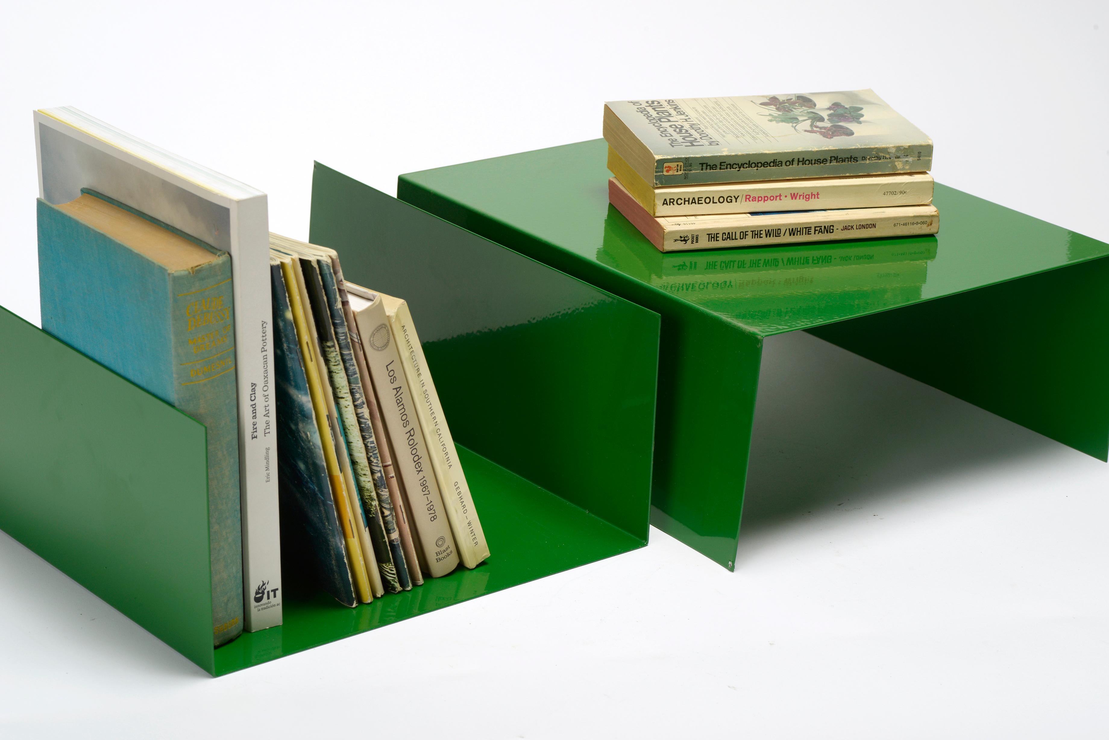 We reclaimed these midcentury aluminum trays for creative use in your office or living room. Use them as organizers to stack books or papers; use them as displays and stand a selection of books between each end; use them as bookends on a shelf. You