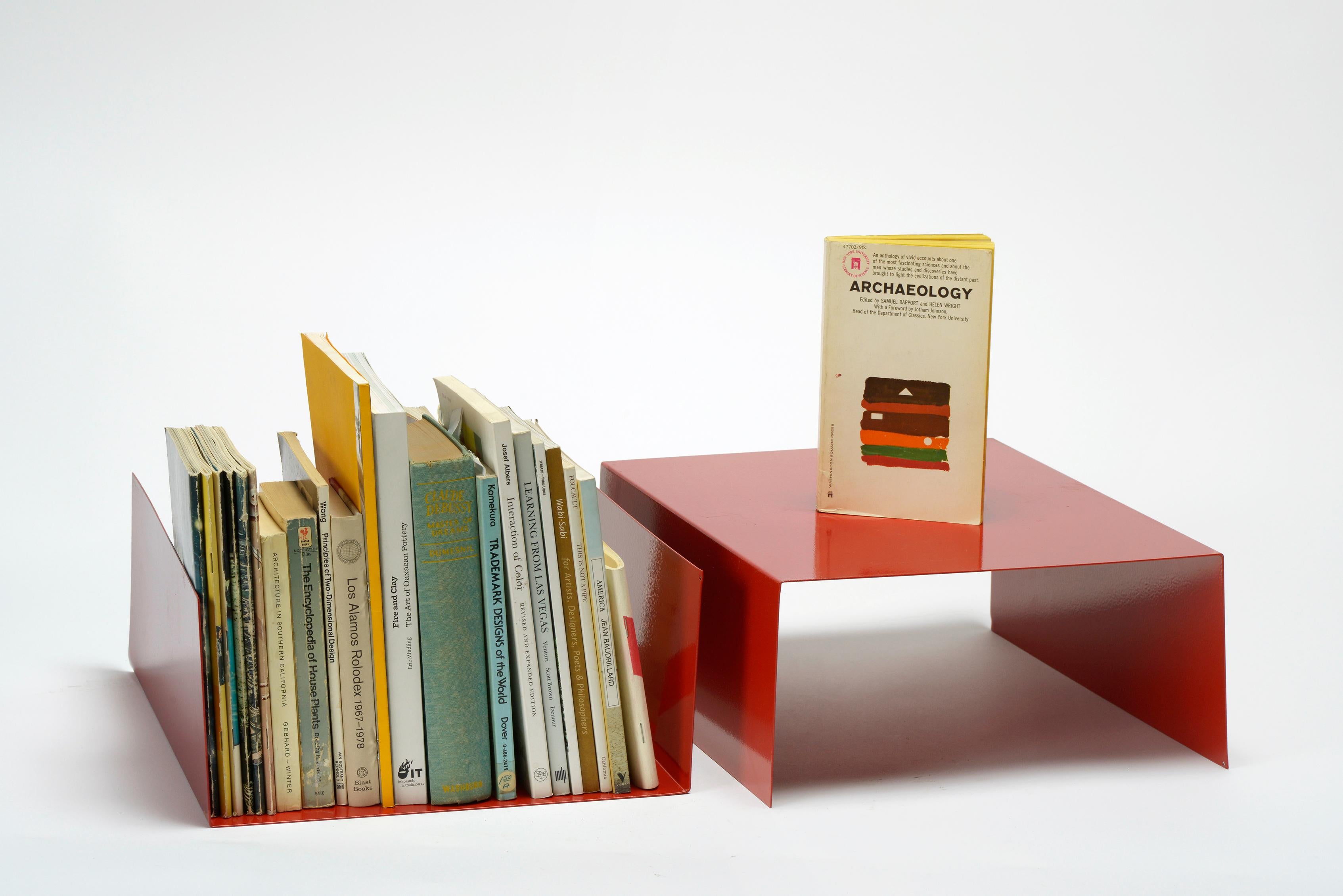 We reclaimed these midcentury aluminum trays for creative use in your office or living room. Use them as organizers to stack books or papers; use them as displays and stand a selection of books between each end; use them as bookends on a shelf. You