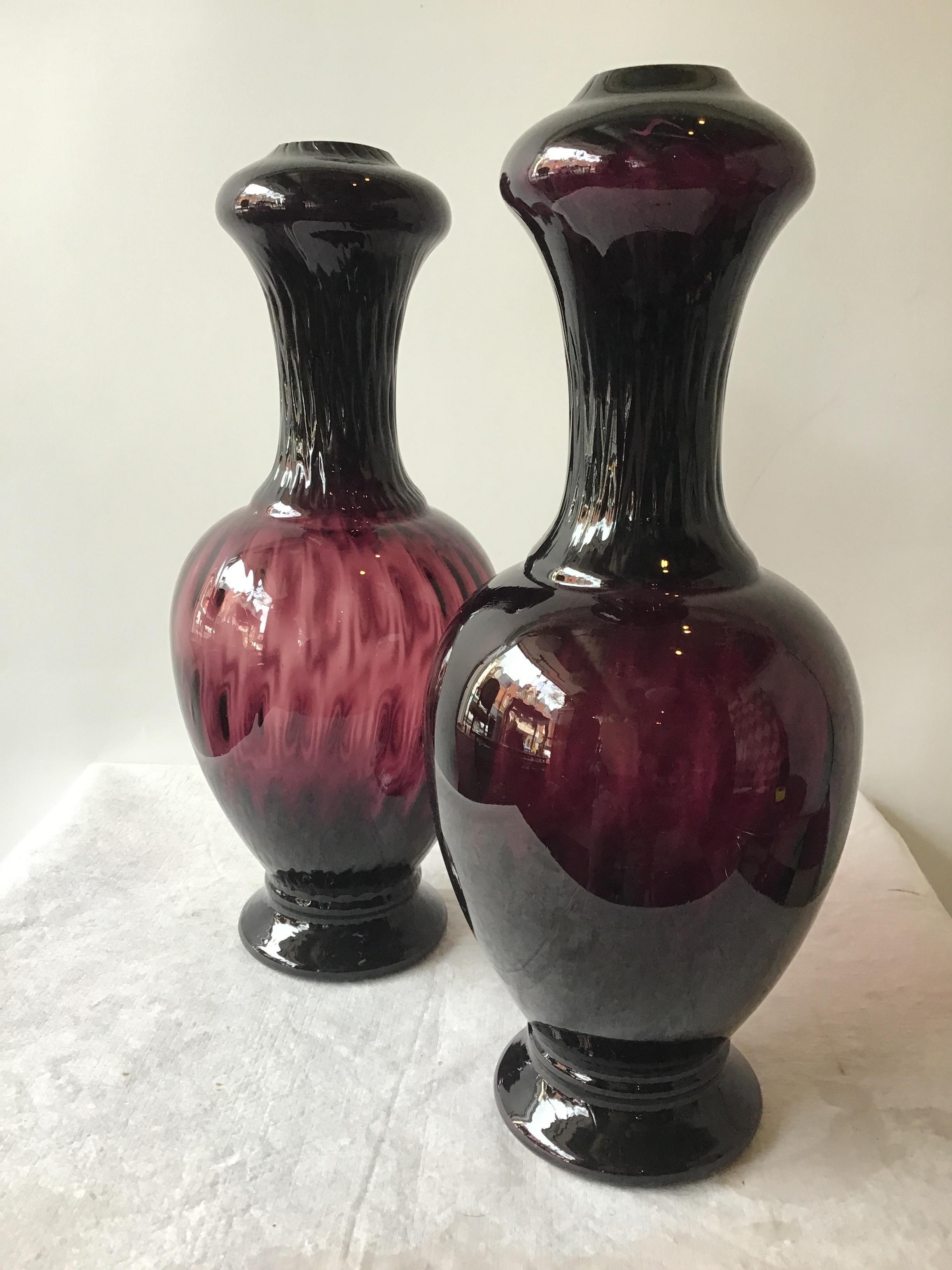 Pair of 1960s Aubergine Murano lamp bodies by Balboa.
Lamps need all parts in order to be turned into functioning lights.
One lamp is darker then the other since there hand blown.