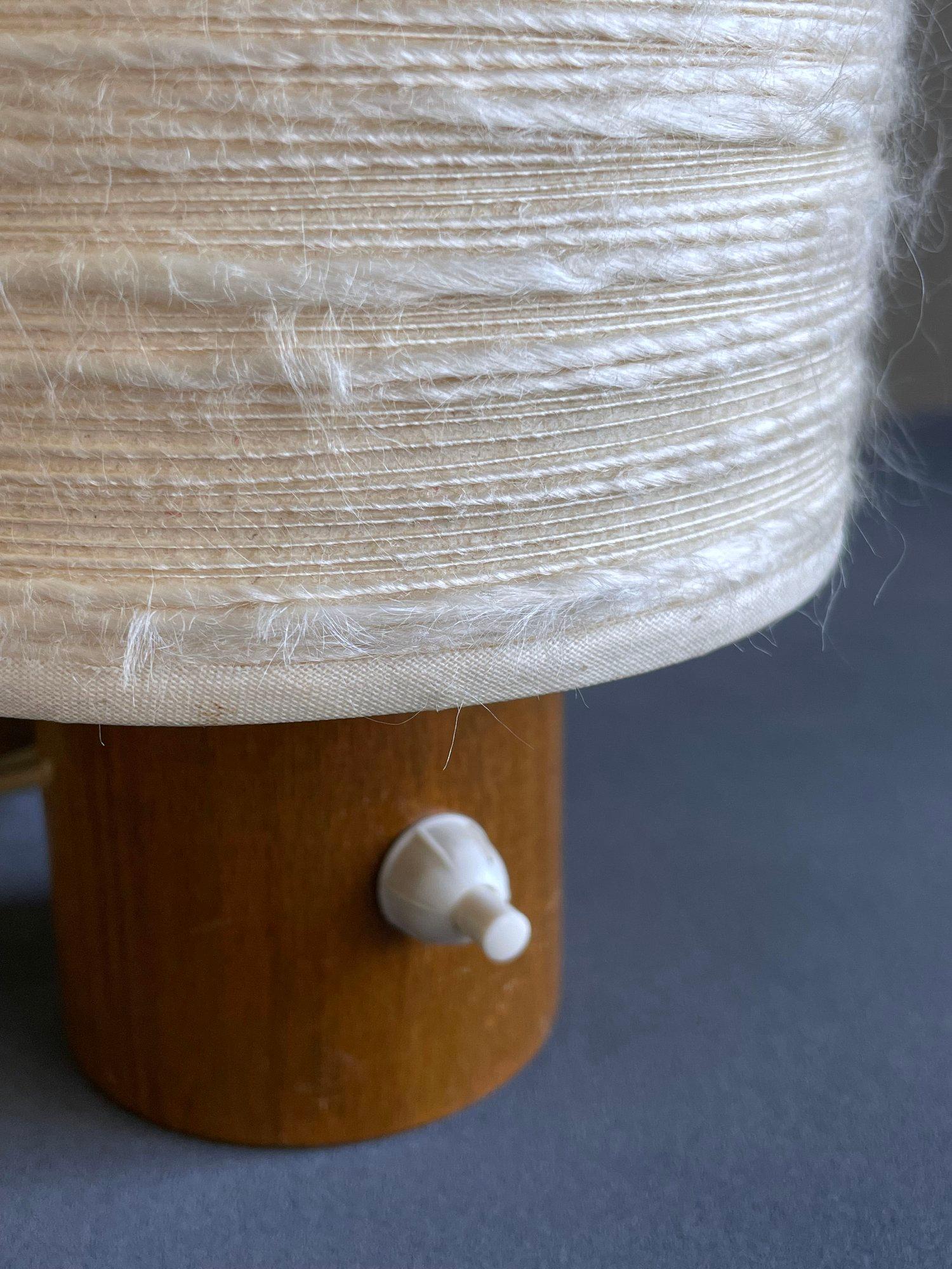 Beautiful pair of 1960's Bedside Table Lamp with synthetic shade set on a solid wooden base. Adjustable light fitting. Synthetic cream shade gives a warm indirect light. Ideal for bedside lighting. Engeler Lampen, Switzerland
Measurements: Height: