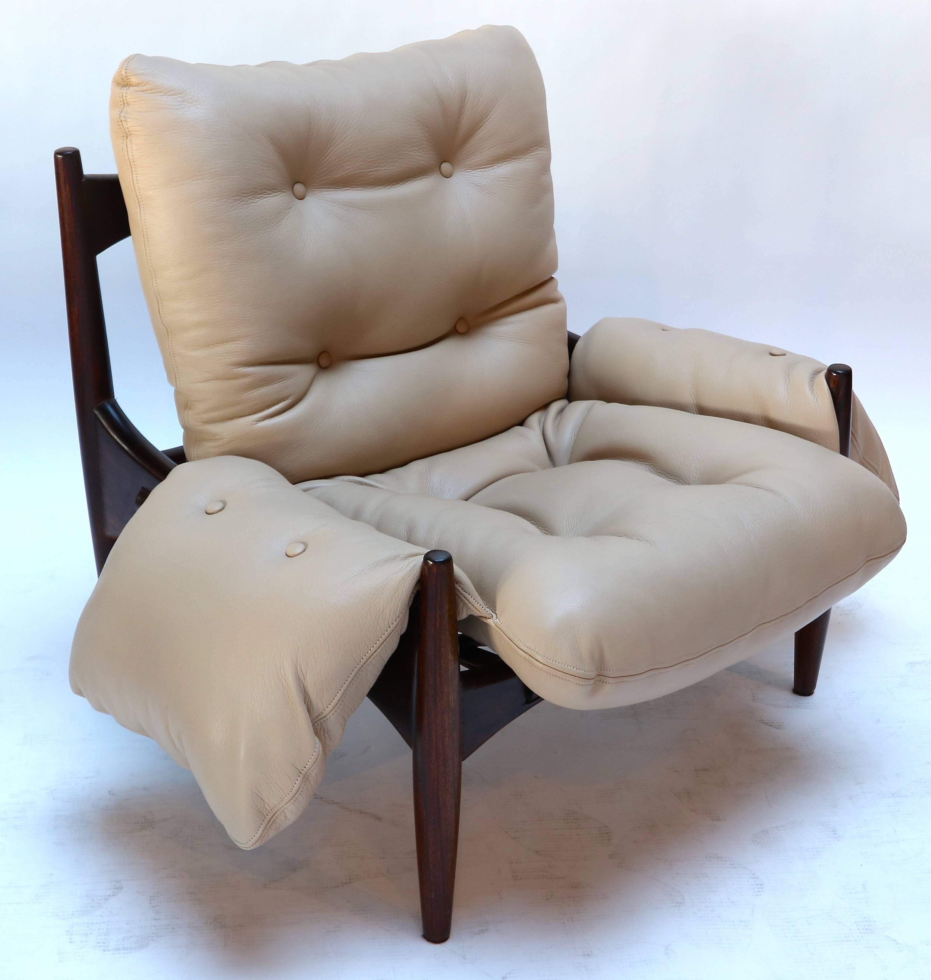 Pair of 1960s Brazilian Jacaranda armchairs in the style of Sergio Rodrigues upholstered in beige leather.