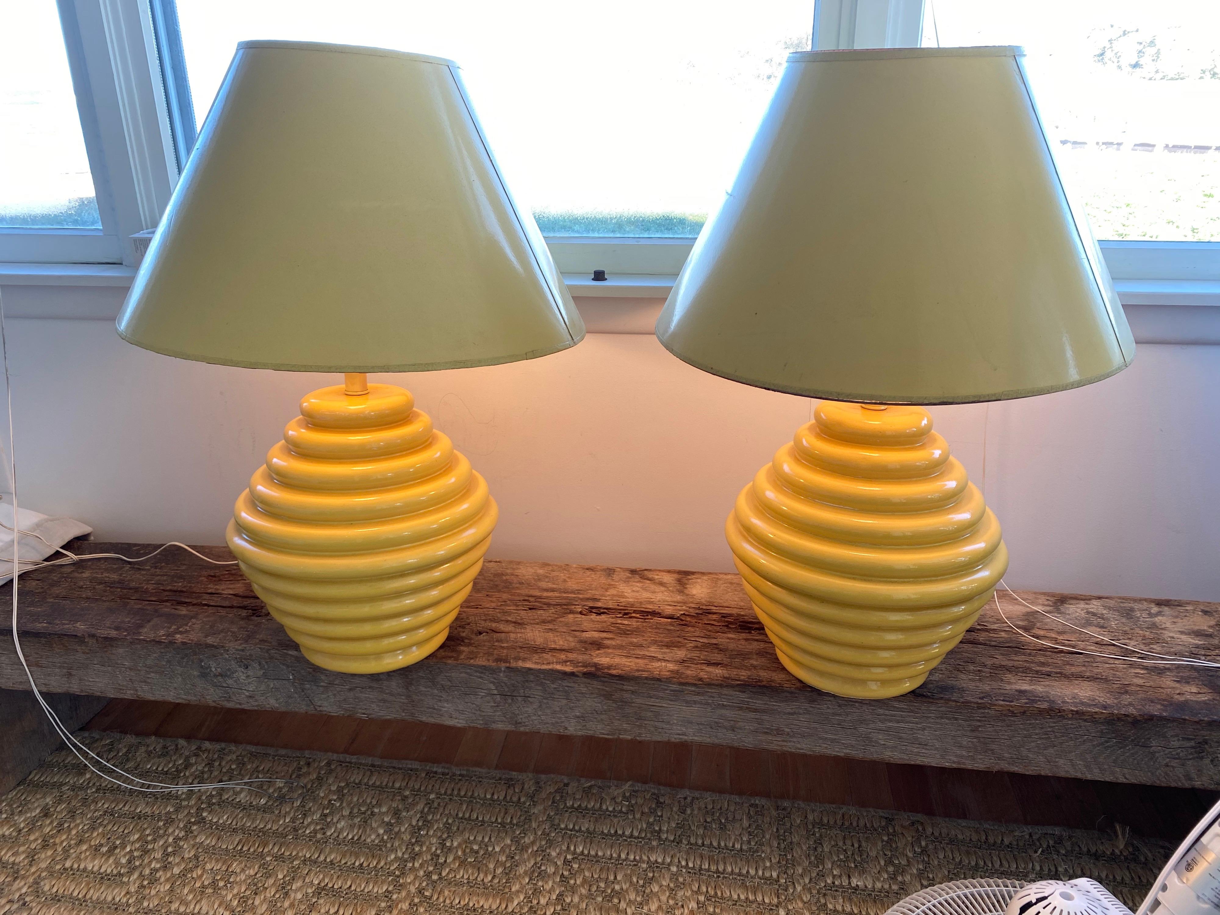 Pair of 1960s ceramic Beehive yellow lamps.
Spunky yellow color beehive ceramic bases in good working condition. Original shades shown in photos are quite worn out and not included. 

Measures: 13.5” diameter x 13” high base
20” diameter x 12.5”