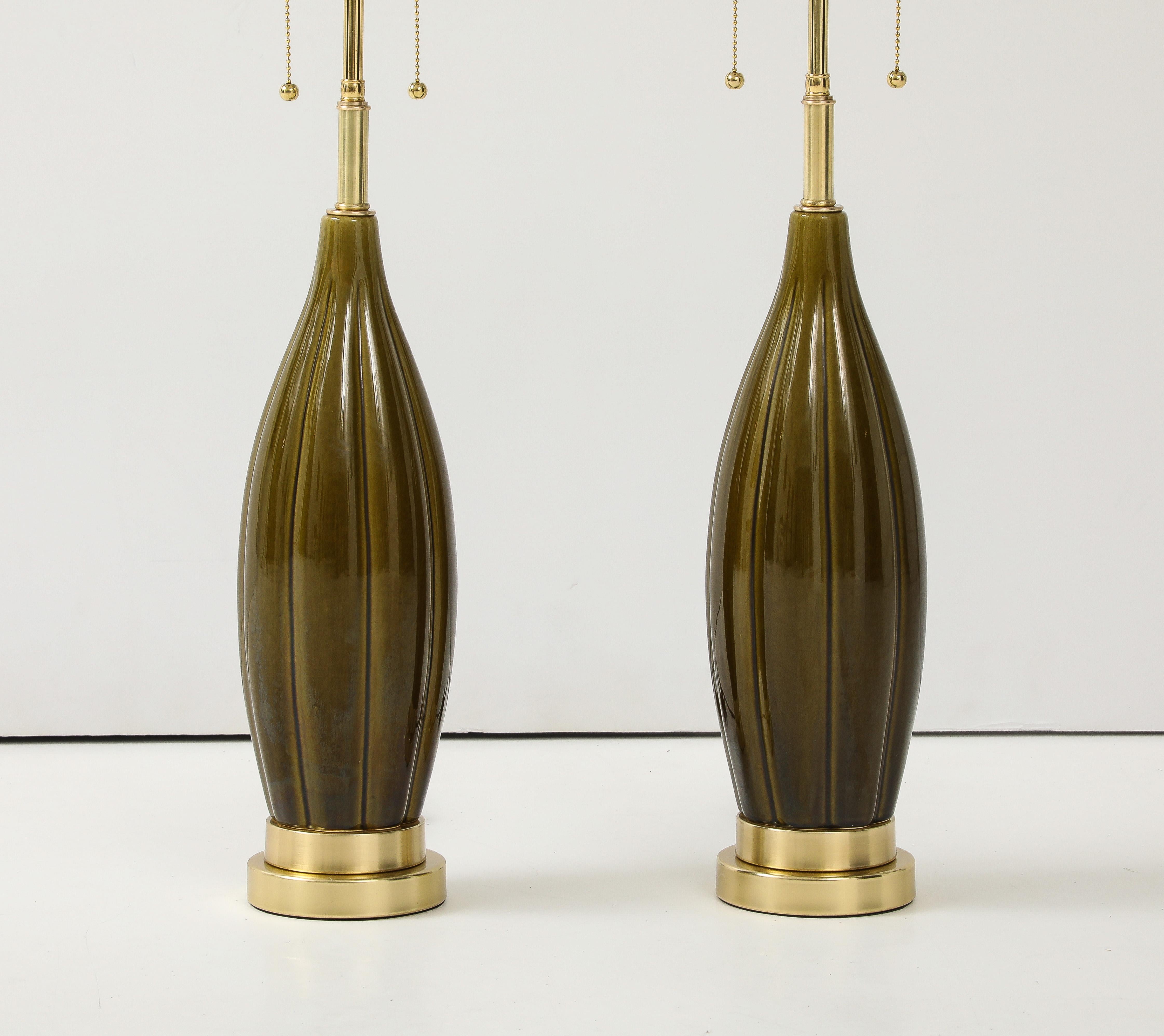 Mid-Century Modern Pair of 1960's Ceramic lamps with a Moss Green Glaze For Sale