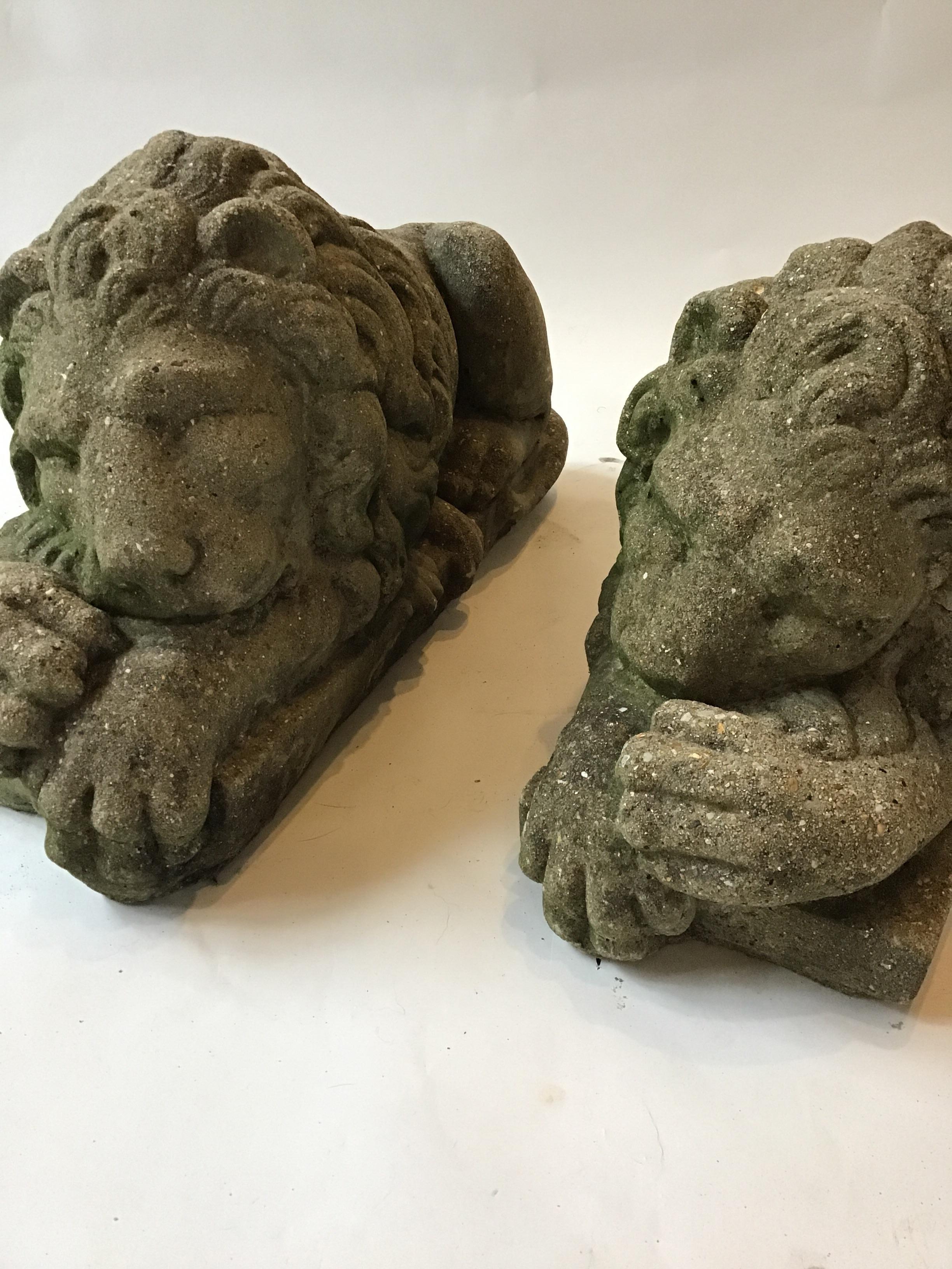 Pair of 1960s concrete sleepy lions from a Greenwich, Connecticut estate.