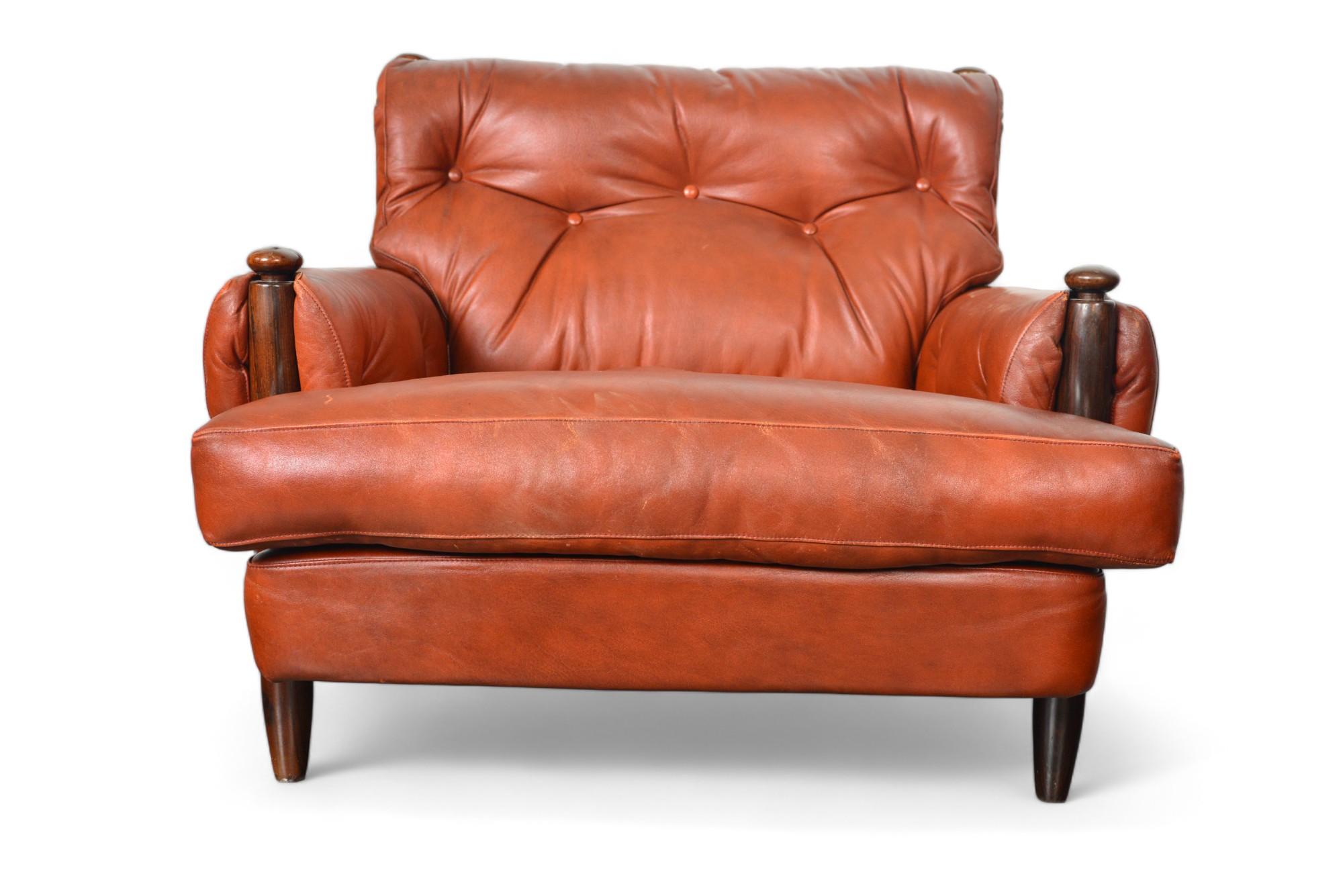 Pair of 1960s Danish Mid Century Solid Rosewood + Rust Leather Lounge Chairs In Good Condition For Sale In Berkeley, CA