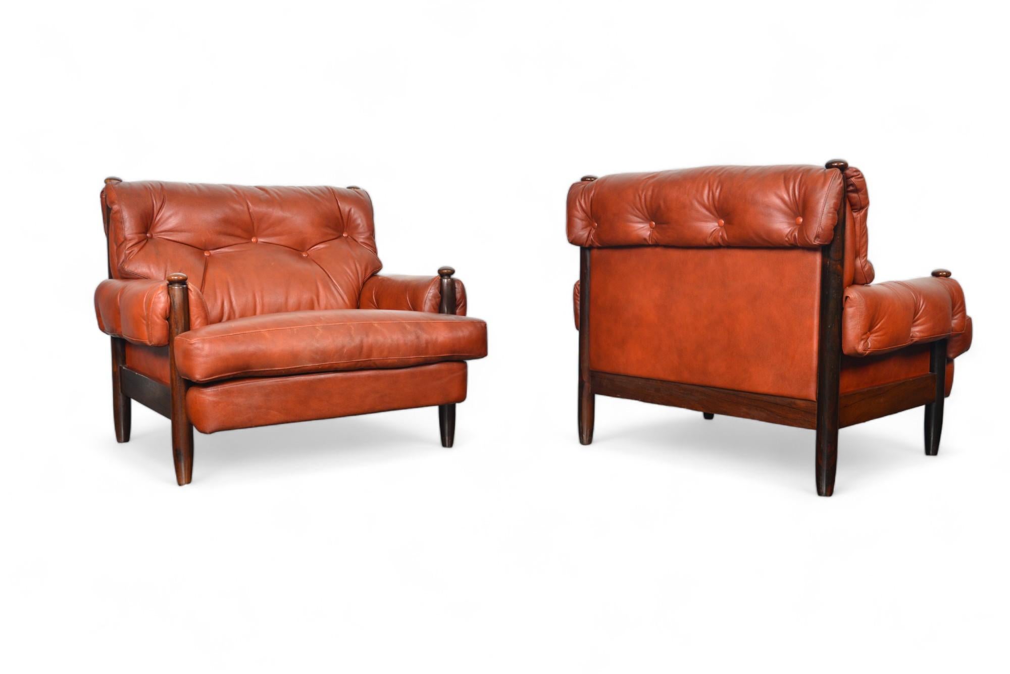 20th Century Pair of 1960s Danish Mid Century Solid Rosewood + Rust Leather Lounge Chairs For Sale