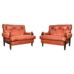 Vintage Pair of 1960s Danish Mid Century Solid Rosewood + Rust Leather Lounge Chairs