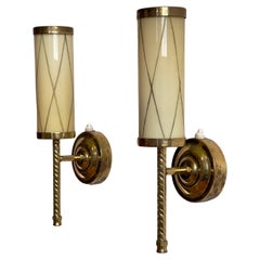 Pair of 1960s Finnish wall lamps in opaline glass attributed to Paavo Tynell.