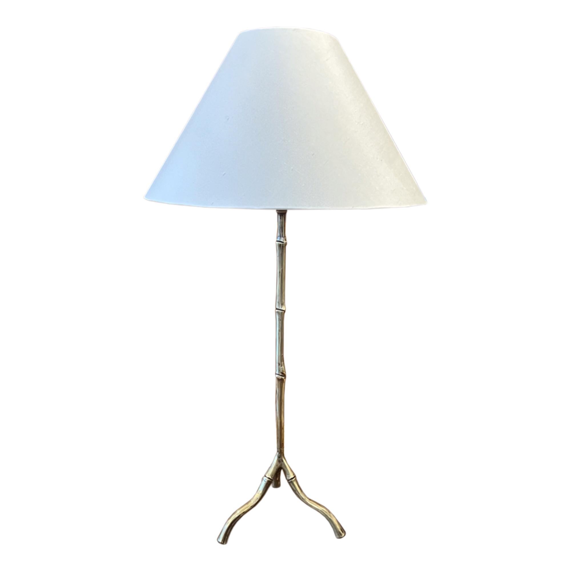 This is a pair of great quality brass table lamps - made in France in the 1960s.

Please take a look at all our pictures to see the lifelike bamboo design - a classic midcentury accessory. 

We've had them rewired with bronze twisted rope flex for