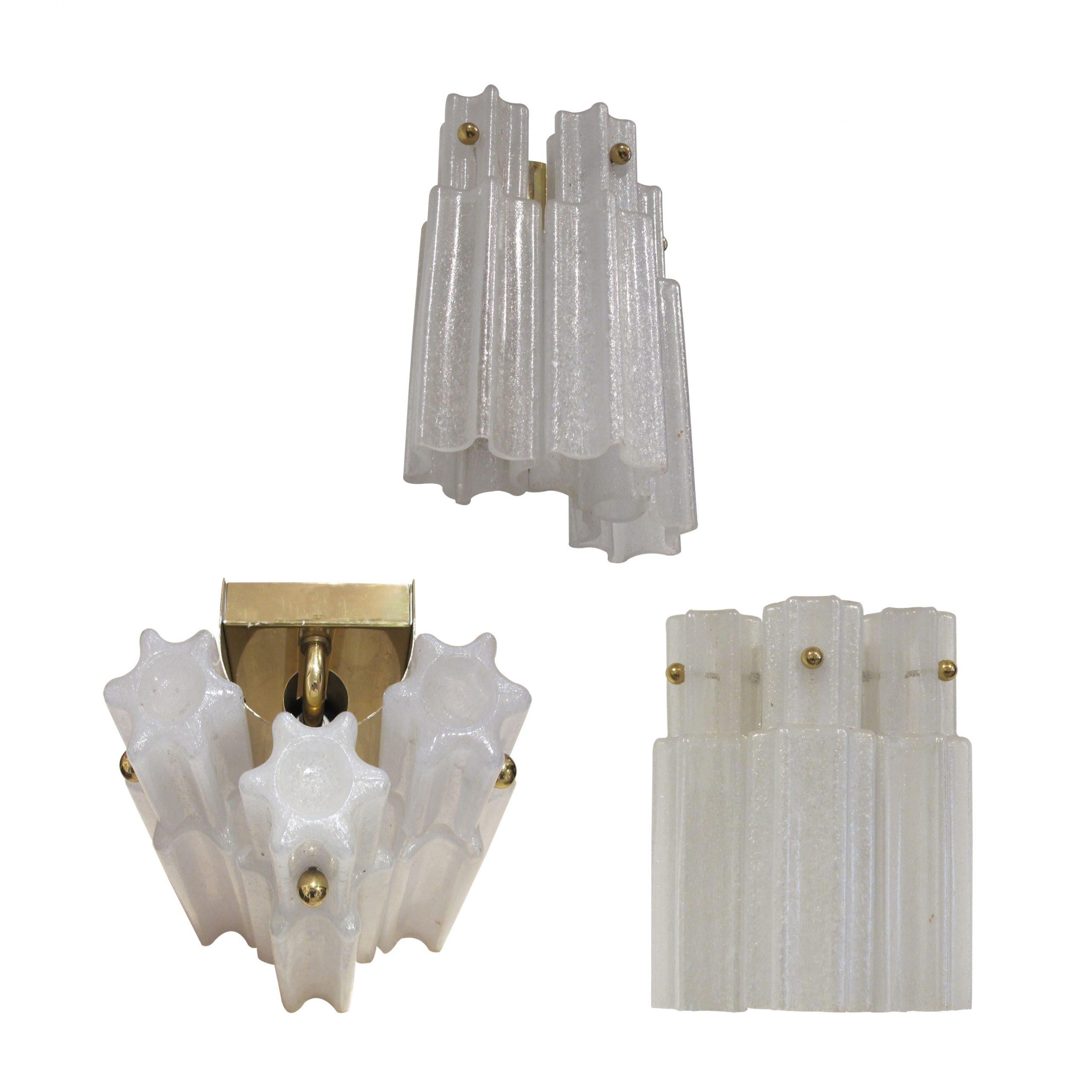A pair of 1960s German flush mount wall lights with hand blown glass in the Venini style. Each wall light features three glass shades which are fitted with brass screw bolts which hold each piece of glass to the frame. The wall lights were