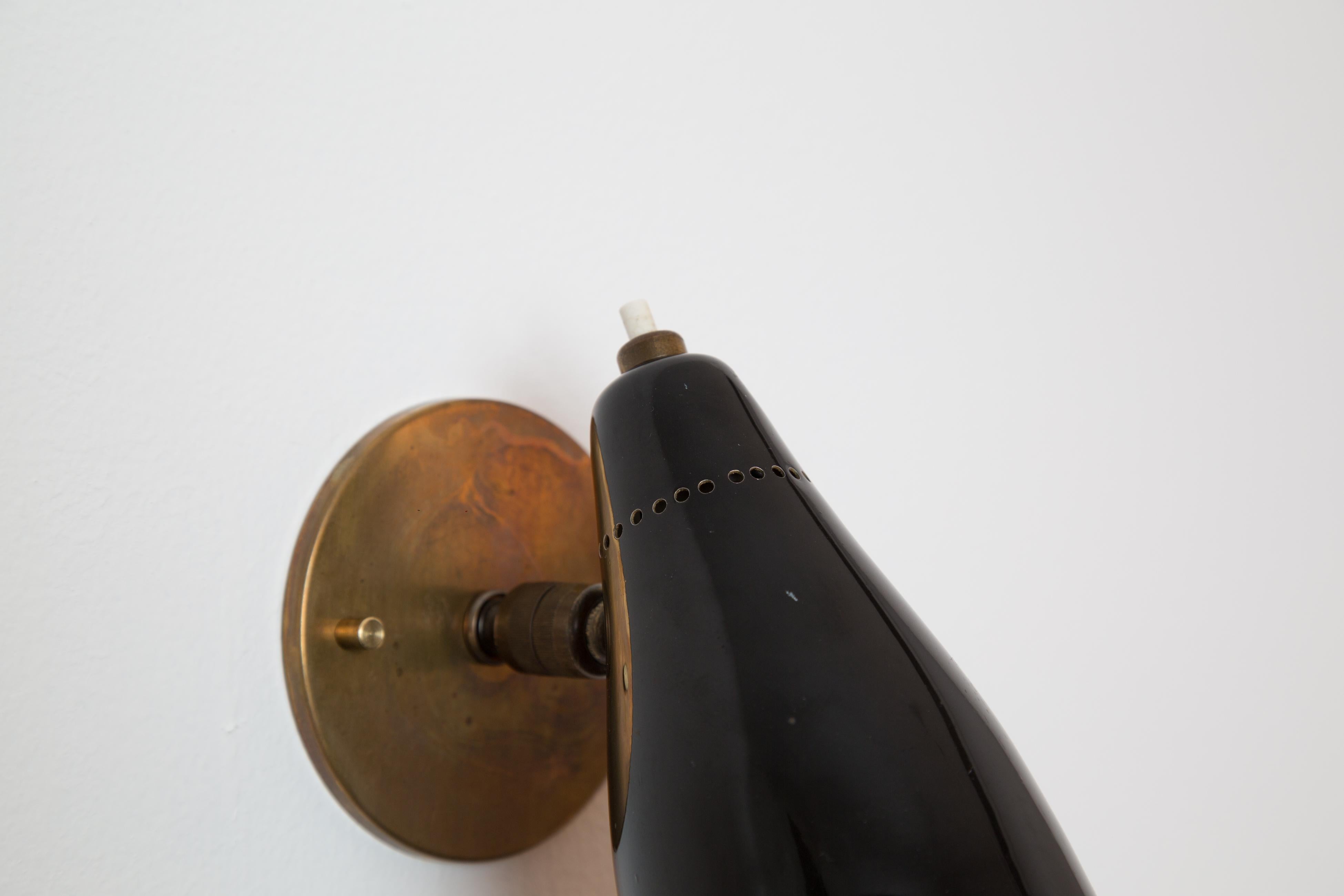Pair of 1950s Giuseppe Ostuni Model #101 Black Articulating Sconces for O-Luce 3