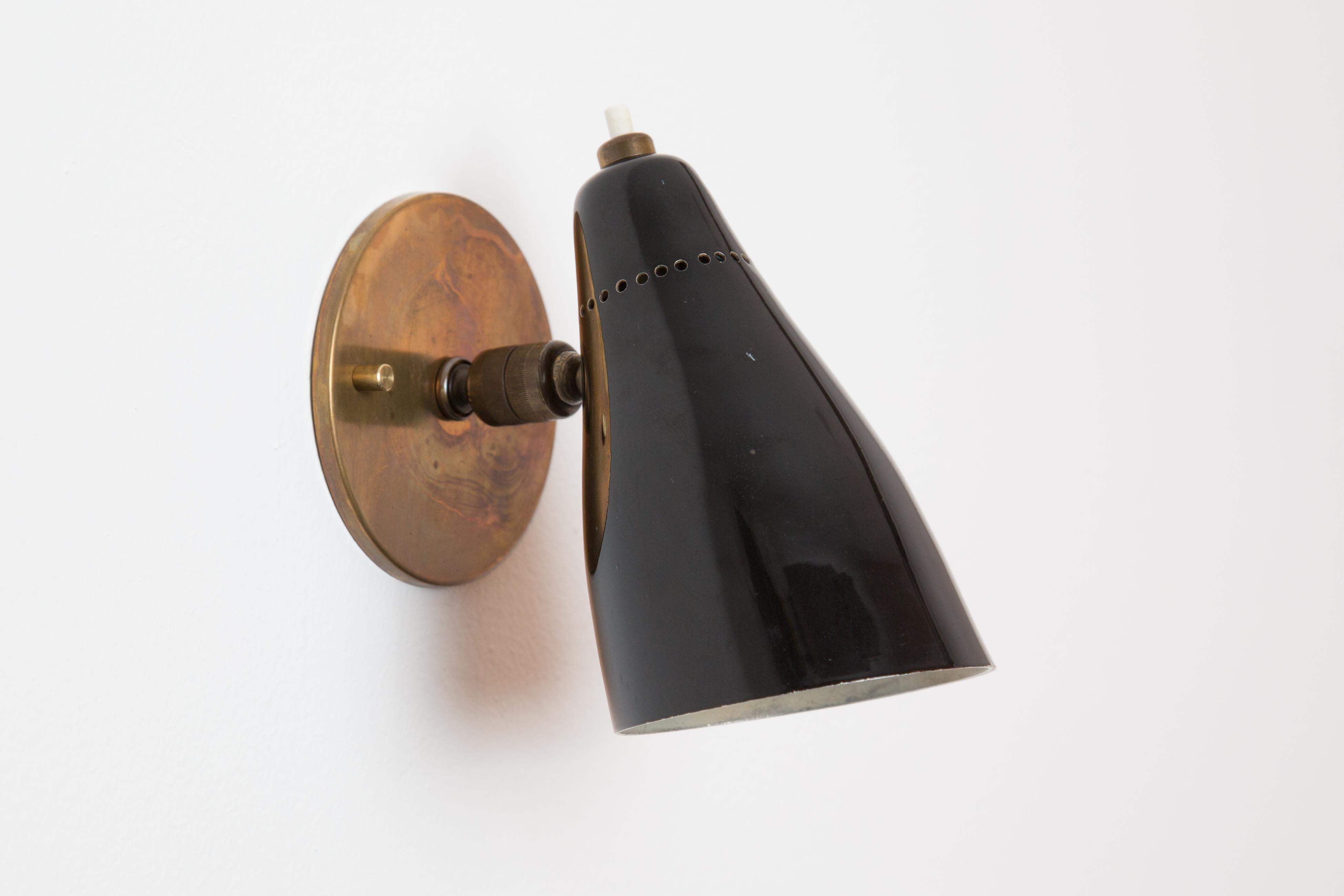 Pair of 1950s Giuseppe Ostuni Model #101 Black Articulating Sconces for O-Luce 1