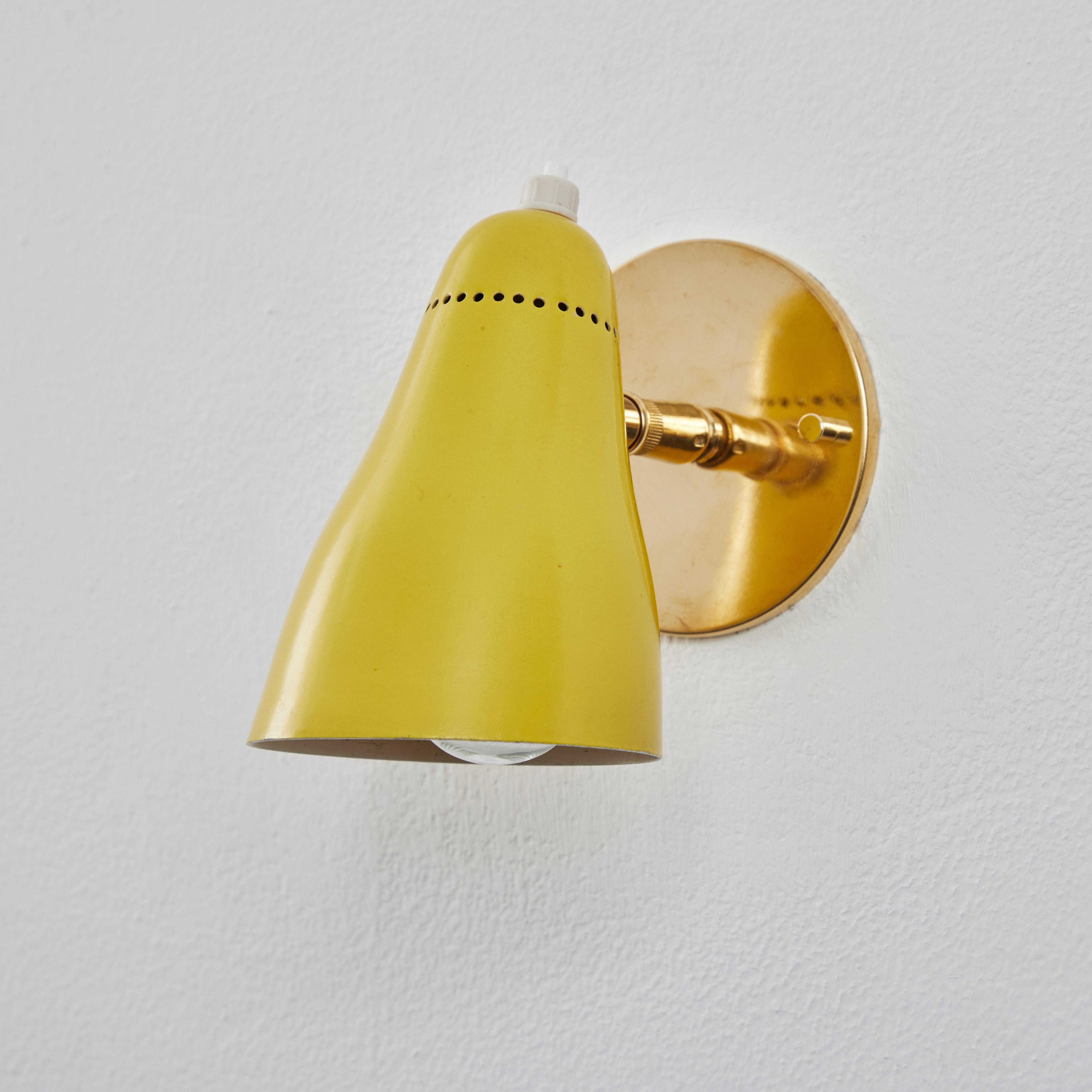 Italian Pair of 1960s Giuseppe Ostuni Model #101 Yellow Articulating Sconces for O-Luce