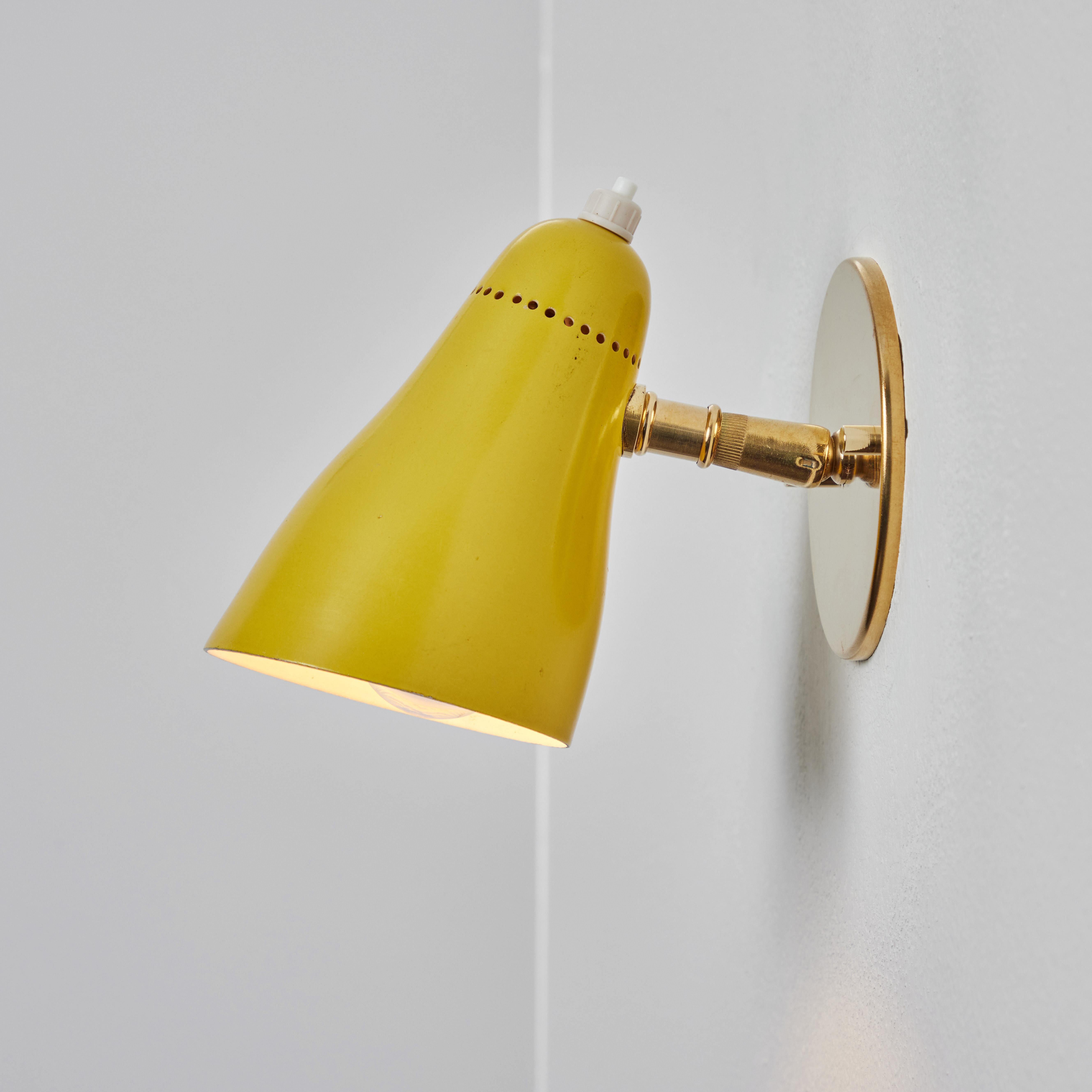 Pair of 1960s Giuseppe Ostuni Model #101 Yellow Articulating Sconces for O-Luce In Good Condition In Glendale, CA