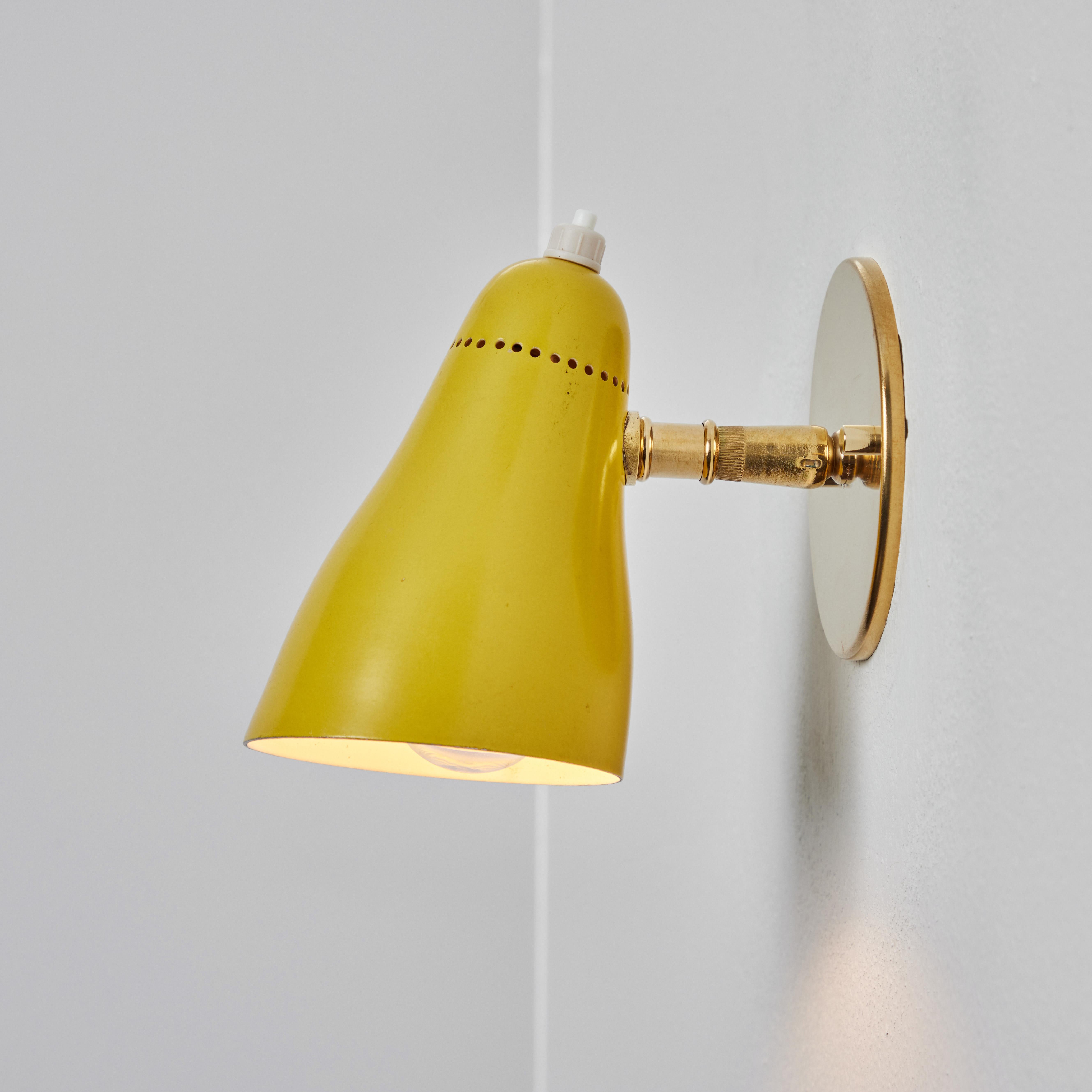 Mid-20th Century Pair of 1960s Giuseppe Ostuni Model #101 Yellow Articulating Sconces for O-Luce