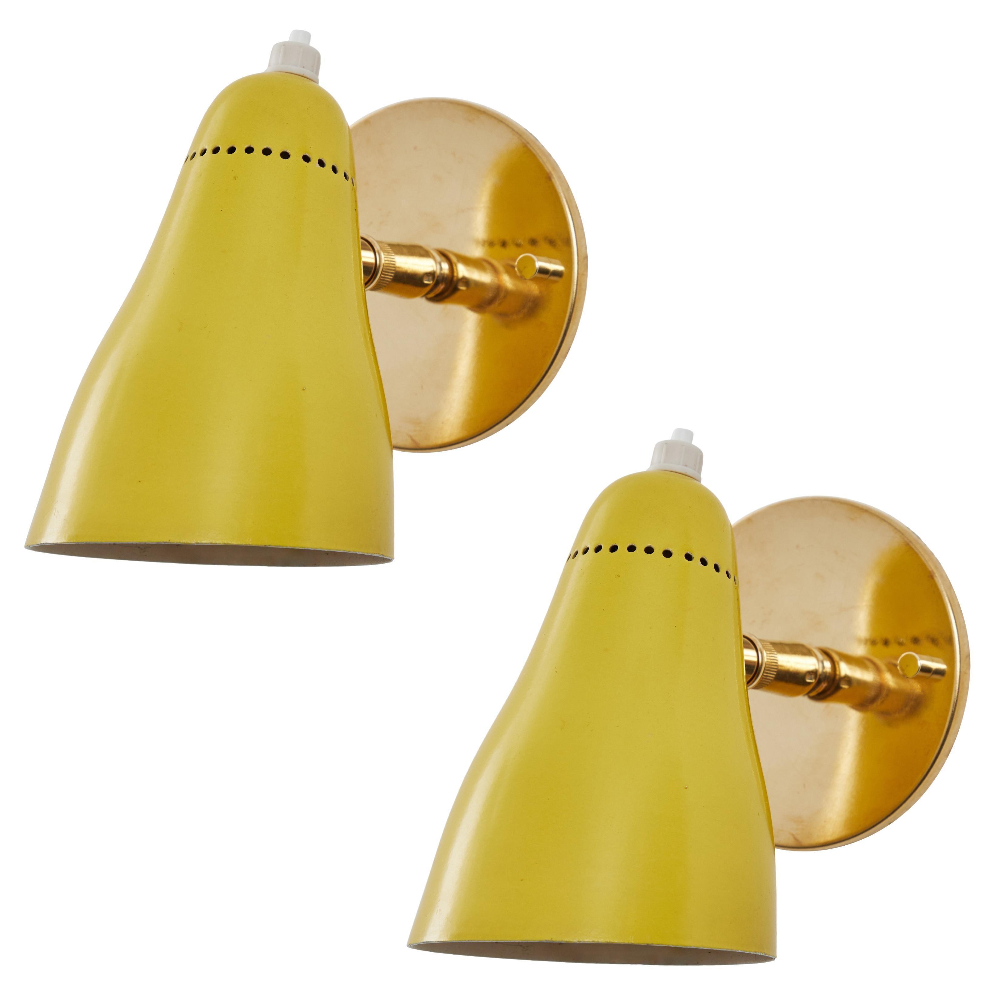 Pair of 1960s Giuseppe Ostuni Model #101 Yellow Articulating Sconces for O-Luce