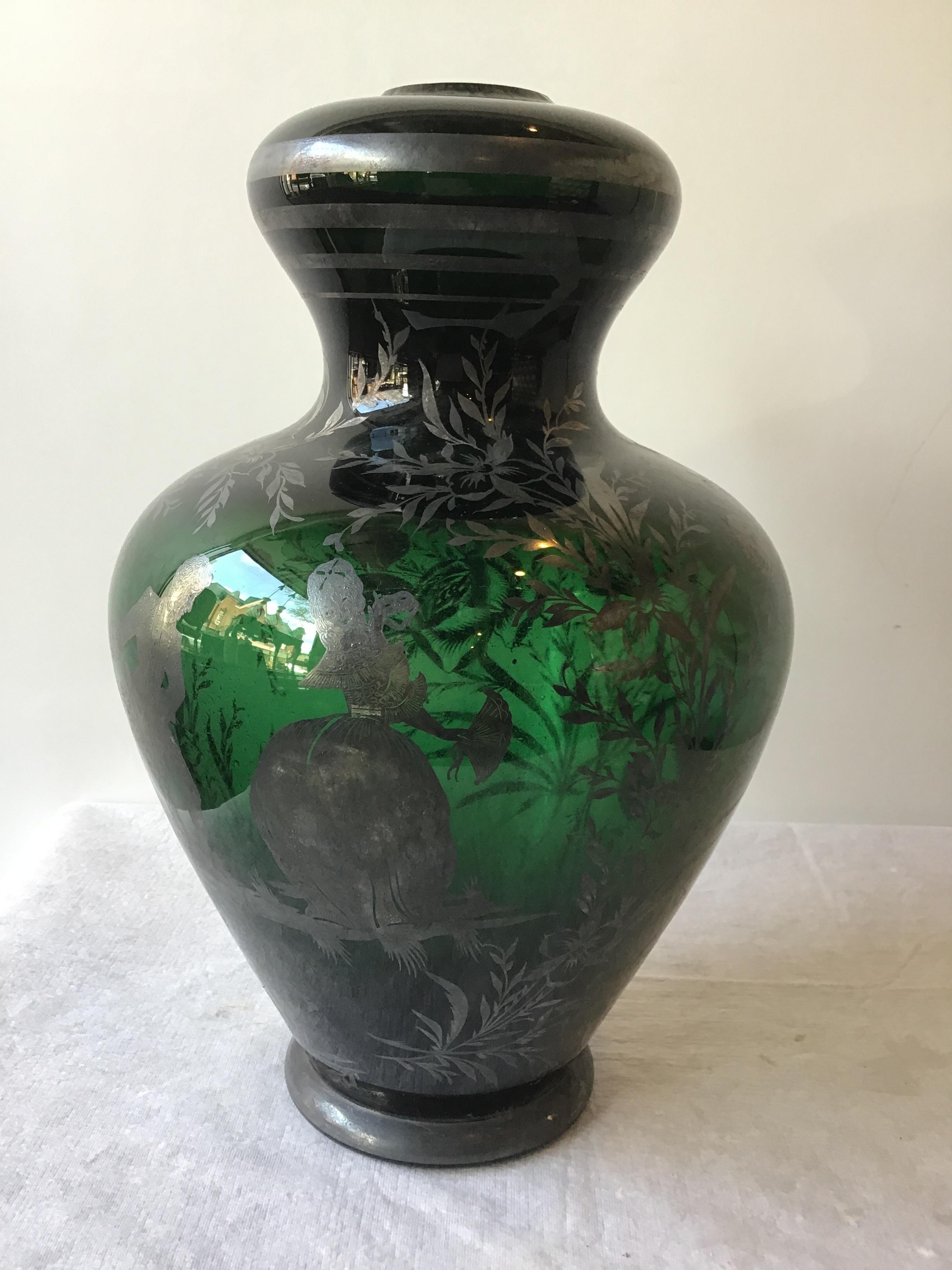 Pair of 1960s green Murano lamp bodies by Balboa. Silver overlay of two 18th century people dancing in a garden.
Lamp body needs all parts to turn into a functioning light.
 