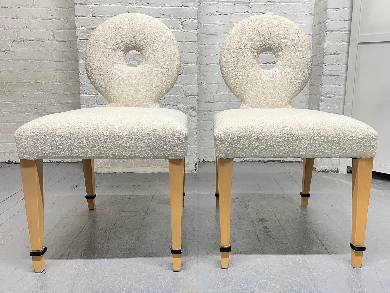 Pair of 1960s Grosfeld House side chairs. The chairs are upholstered in Boucle and have solid maple legs with black trim.
 