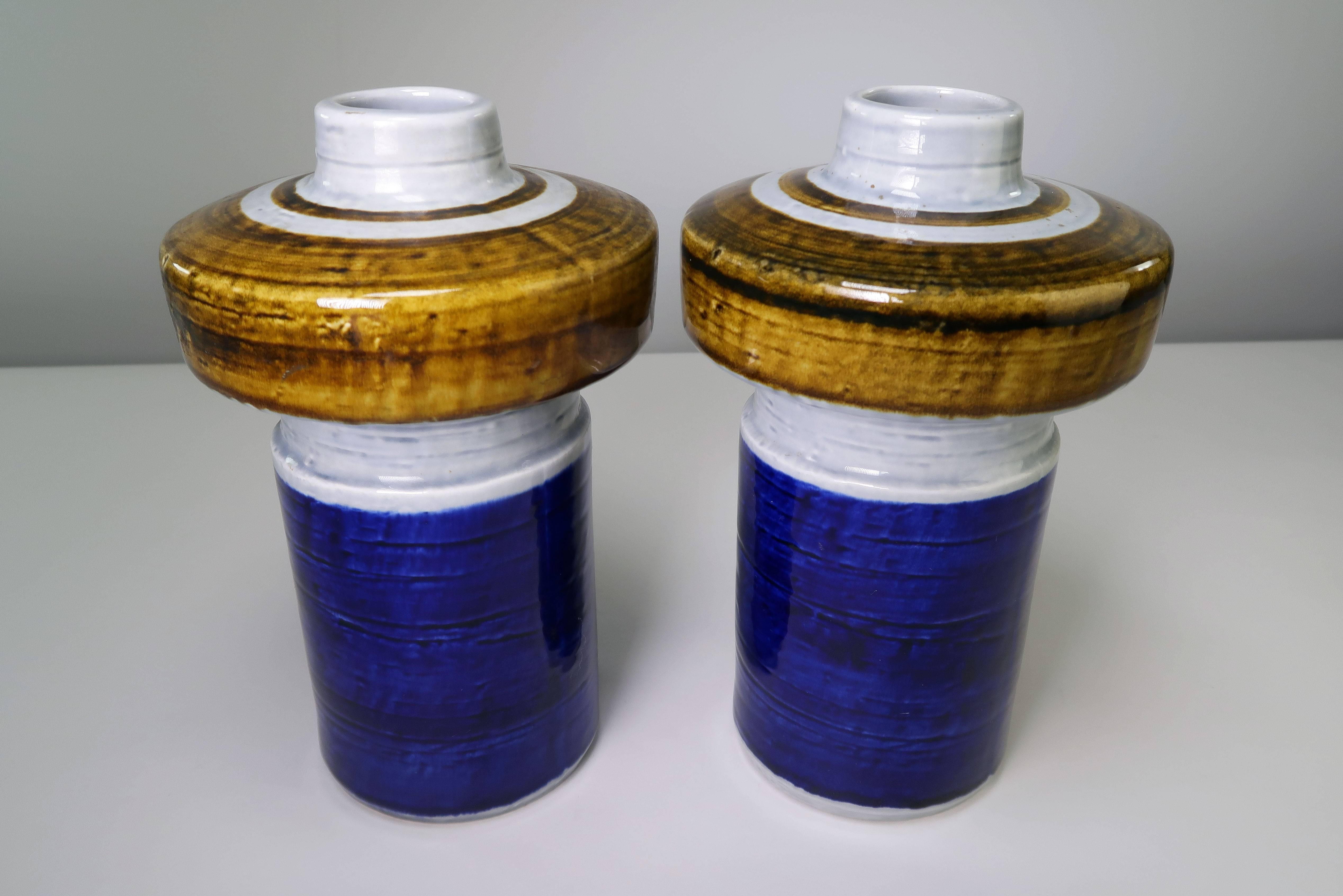 Pair of handmade, hand-painted ceramic vases by Olle Alberius for Swedish Rörstrand in the 1960s. Cobalt blue base with light grey and hot curry glazed top. Light grey glaze on the inside. From the Titus series. Stamped on base.