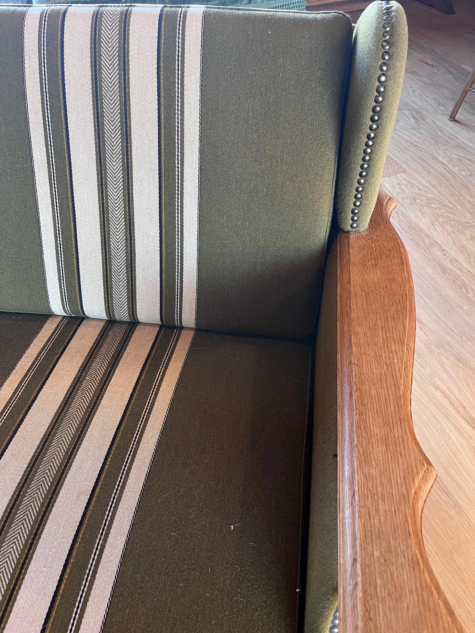 Upholstery Pair of 1960s Henning Kjaernulf Attributed Oak Lounge Chairs