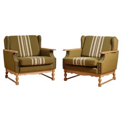 Pair of 1960s Henning Kjaernulf Attributed Oak Lounge Chairs