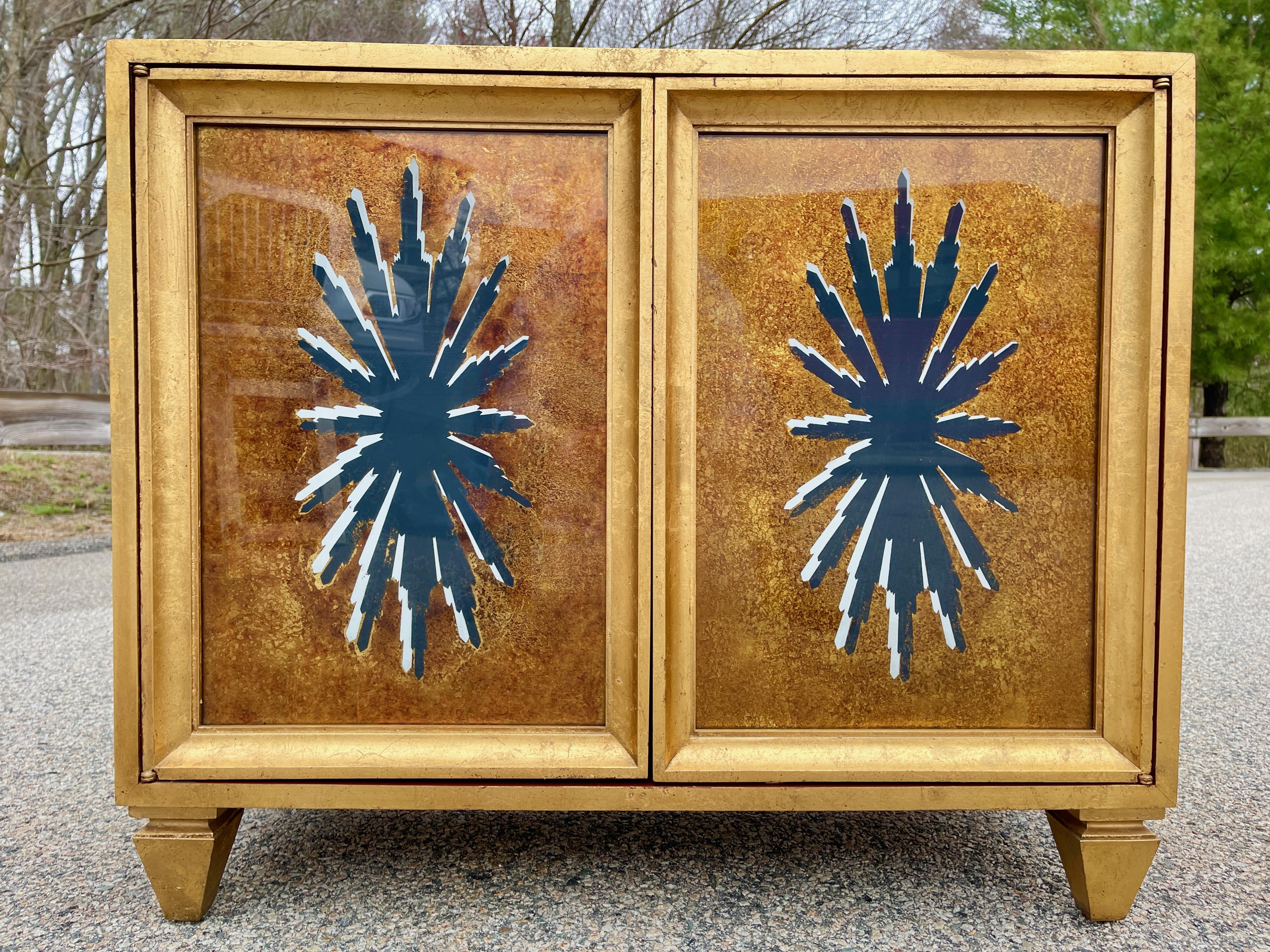 American Pair of 1960's Hollywood Regency Duquette Style Gold Leaf & Eglomise Cabinets For Sale