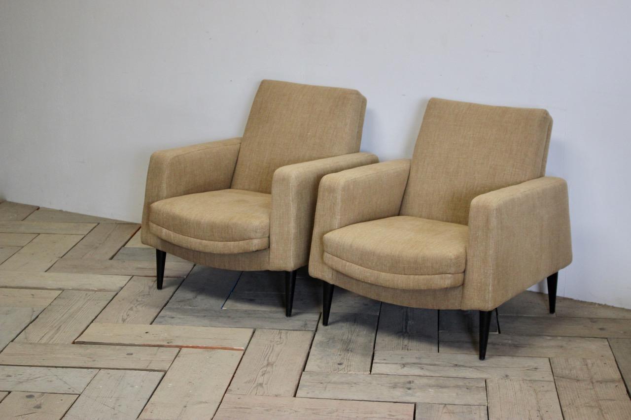 Good pair of Italian armchairs a very stylish pair of circa 1960s Italian armchairs recently reupholstered by us. This elegant and comfortable pair of armchairs will work well in a contemporary setting.