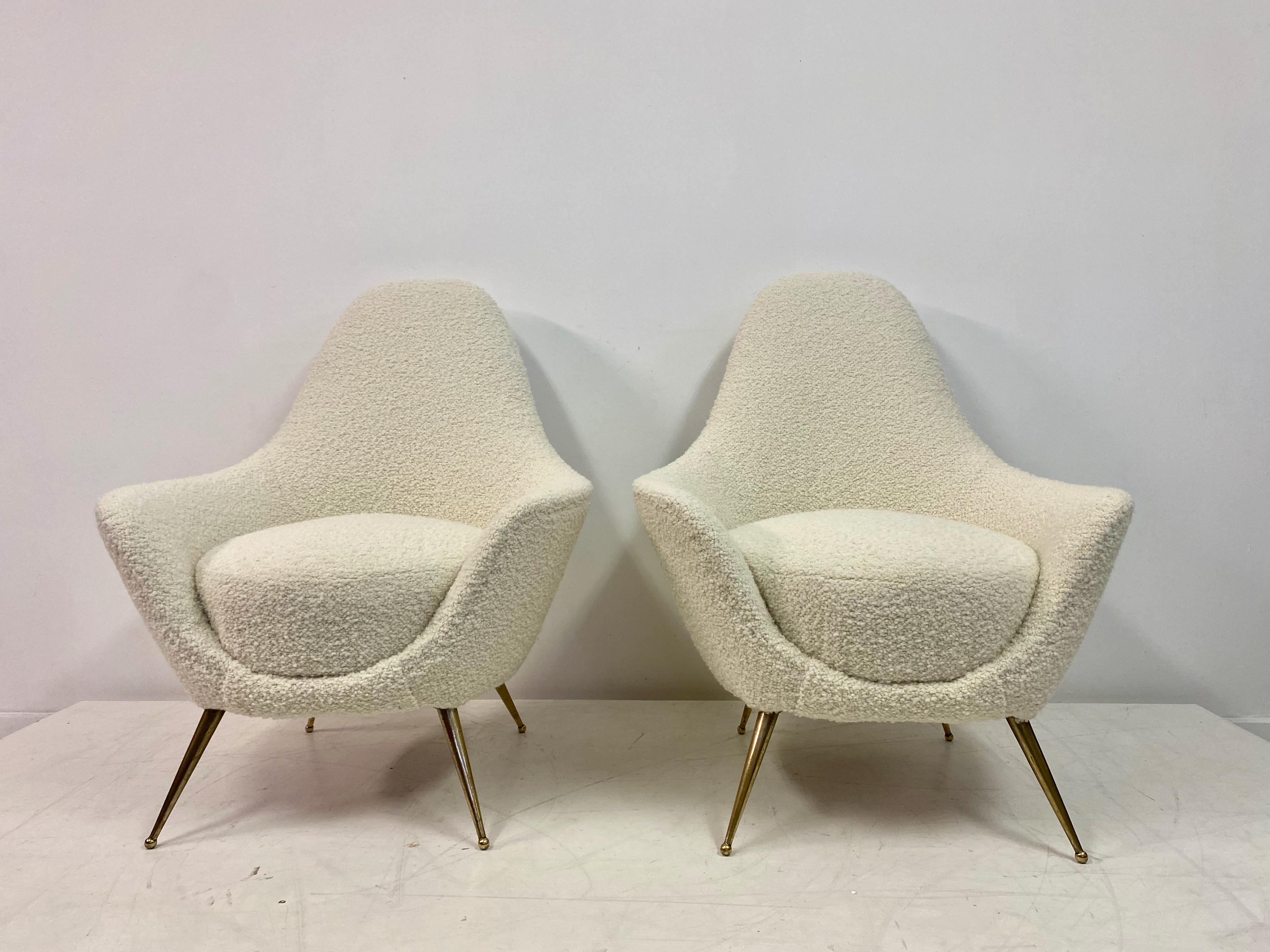 Pair of armchairs

Newly upholstered in Designers Guild Boucle

Brass legs

Seat height 42cm

Italy 1960s.