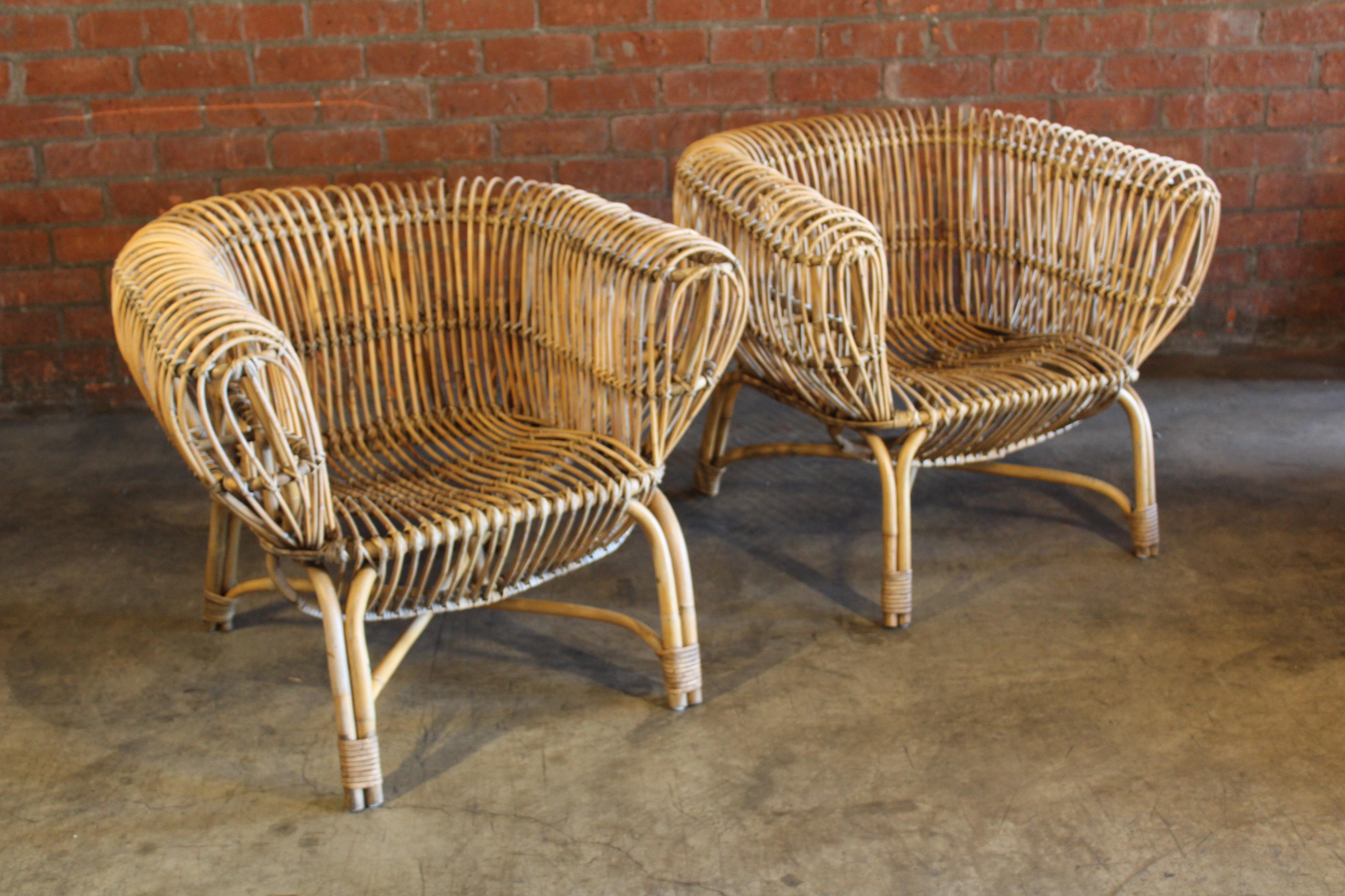 Pair of vintage bamboo and rattan chairs, attributed to Franco Albini, Italy, 1960s. They are in overall good condition with age appropriate wear. Suitable for indoor or outdoor use.