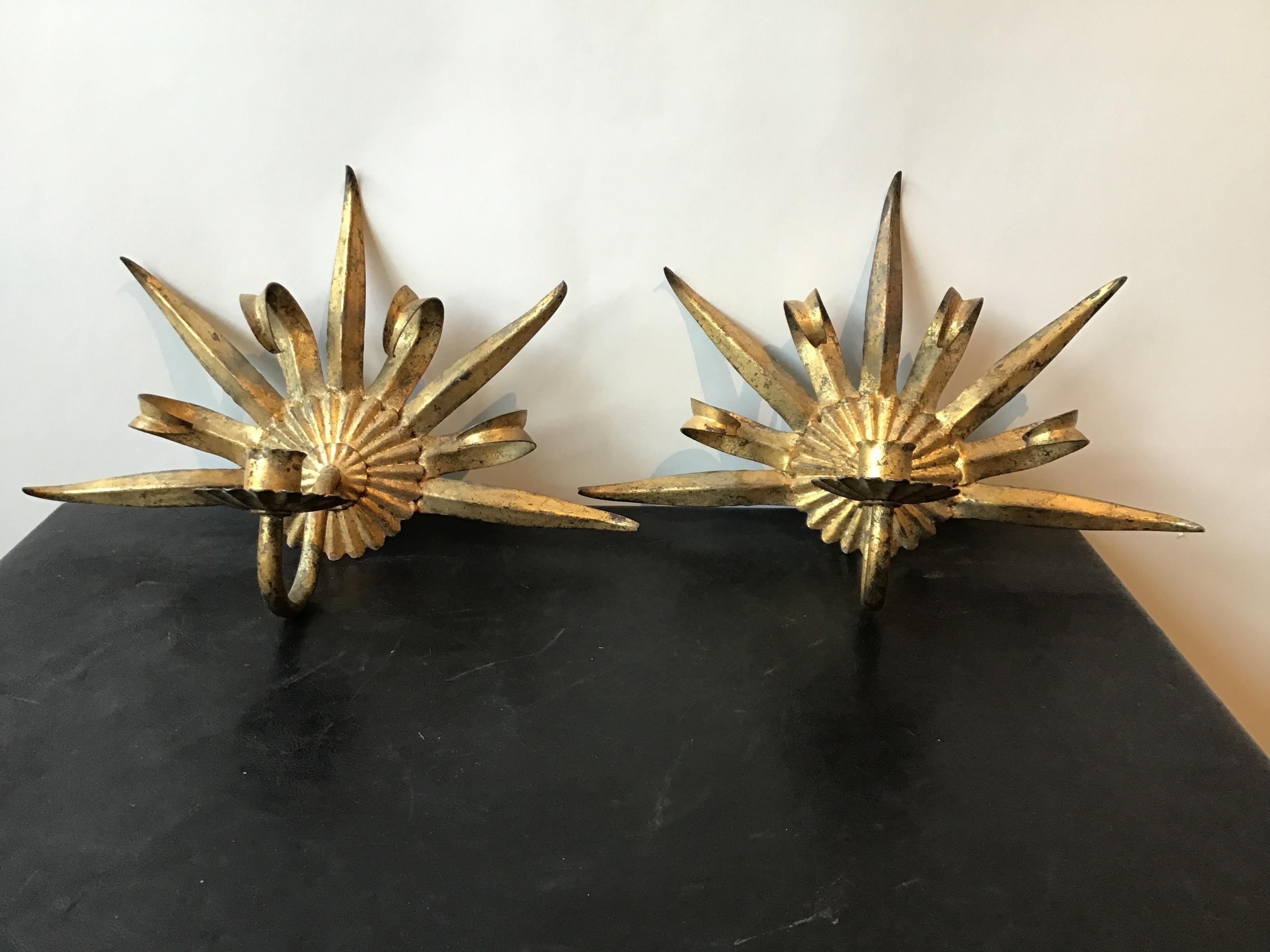 Pair of 1960s Italian gilt iron sunburst sconces.