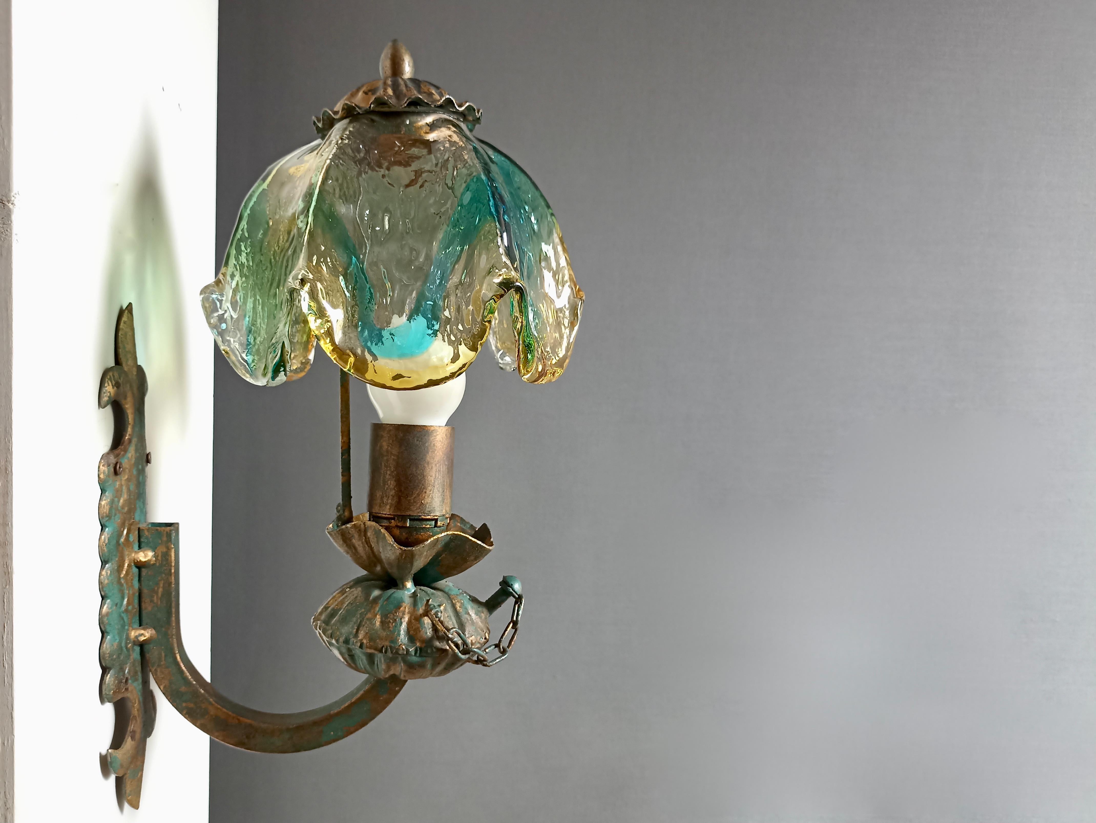 Brutalist Pair of 1960s Italian hand-made sconces in metal and Murano multicolored glass.