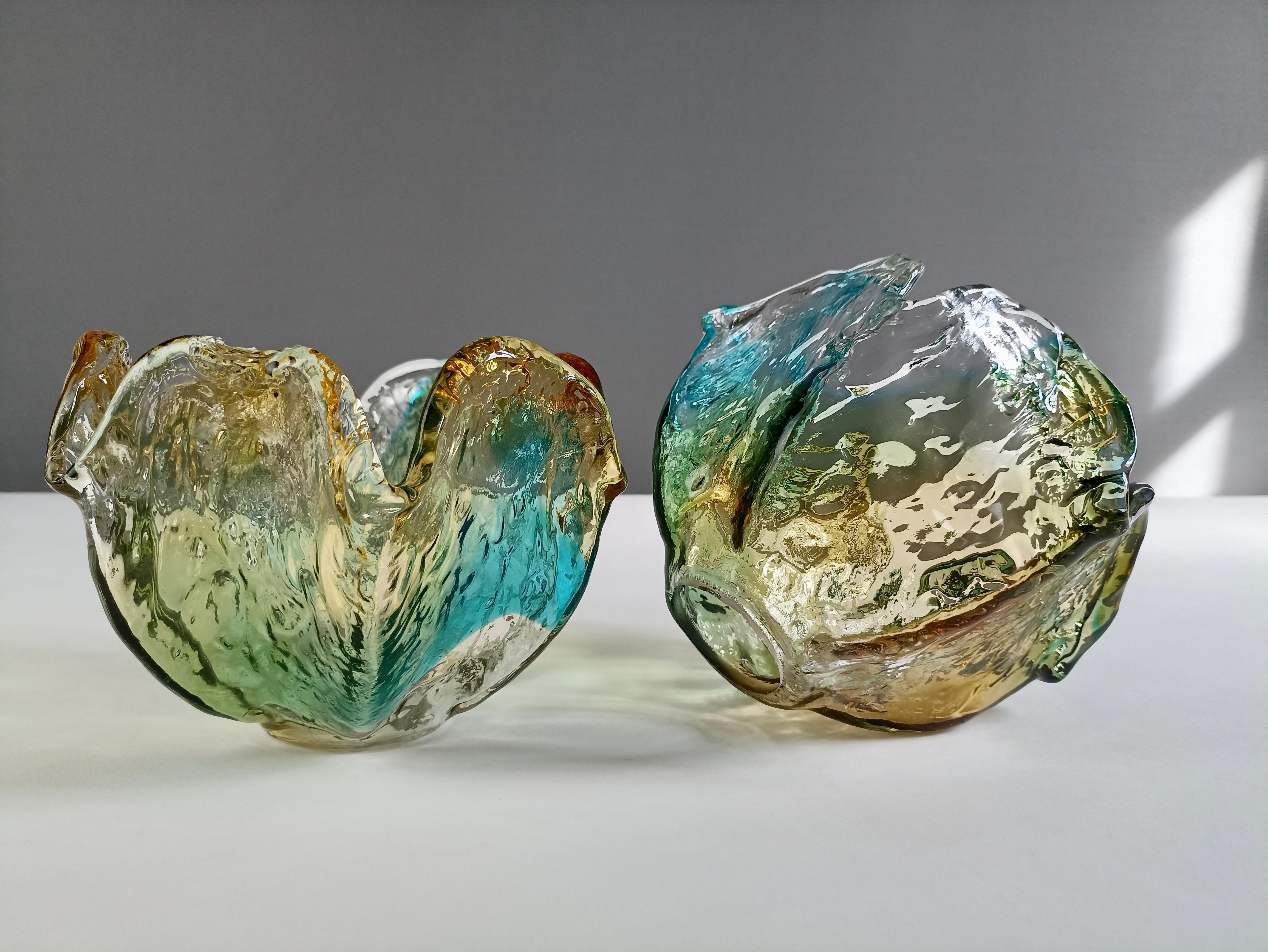 Mid-20th Century Pair of 1960s Italian hand-made sconces in metal and Murano multicolored glass.