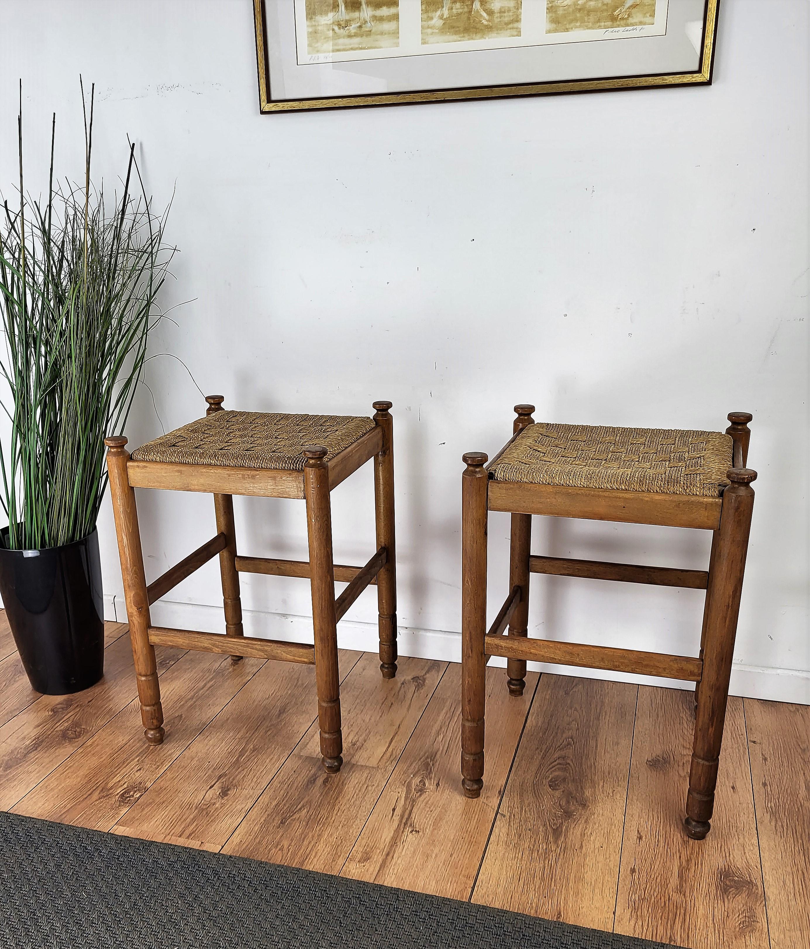 Mid-Century Modern Pair of 1960s Italian Midcentury Carved Wood and Cord Woven Rope Stools For Sale