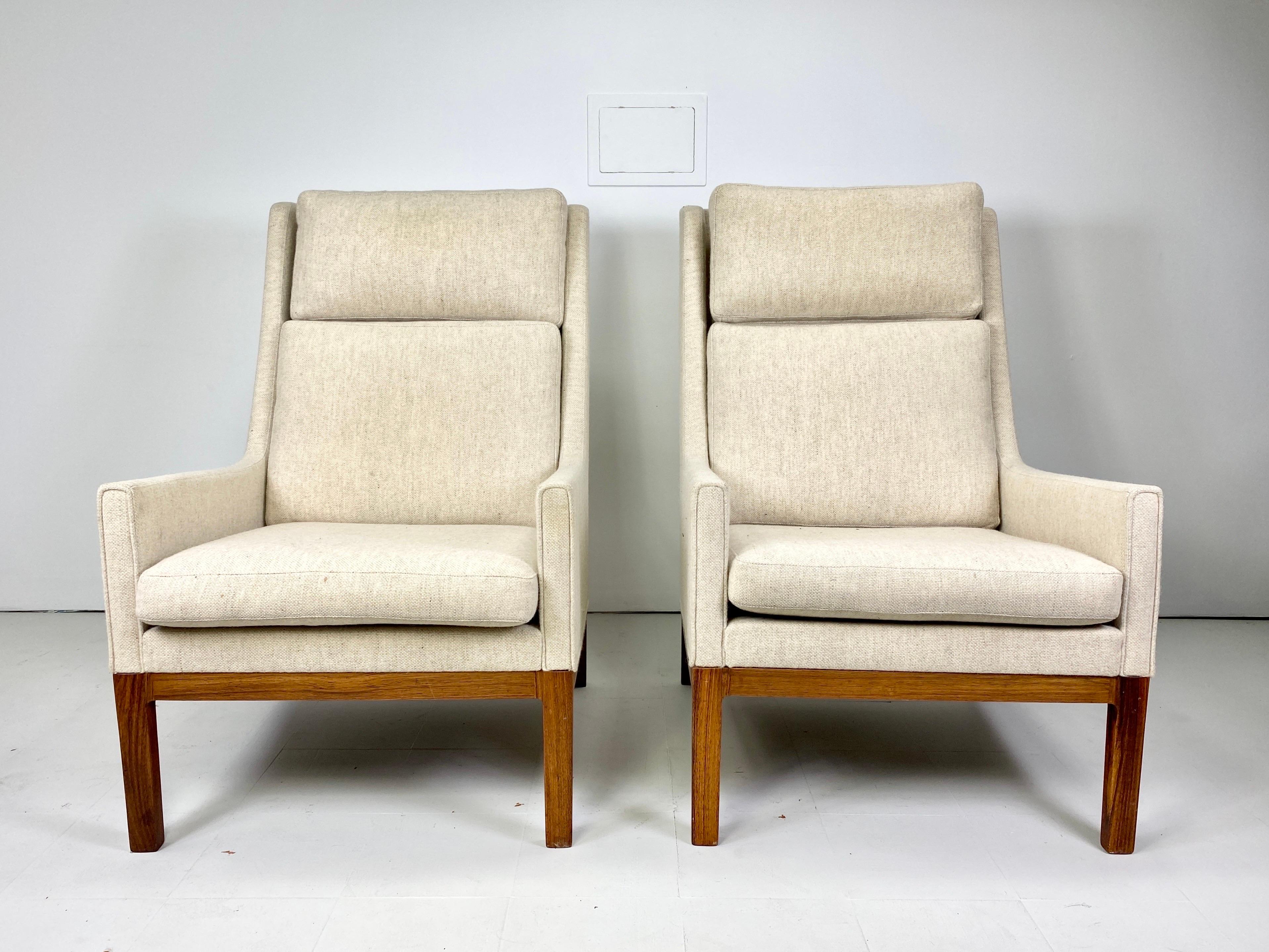 Pair of Danish Lounge Chairs designed by Kai Lyngfeldt Larsen. Newer upholstery. Rosewood frames. Denmark, 1960s.