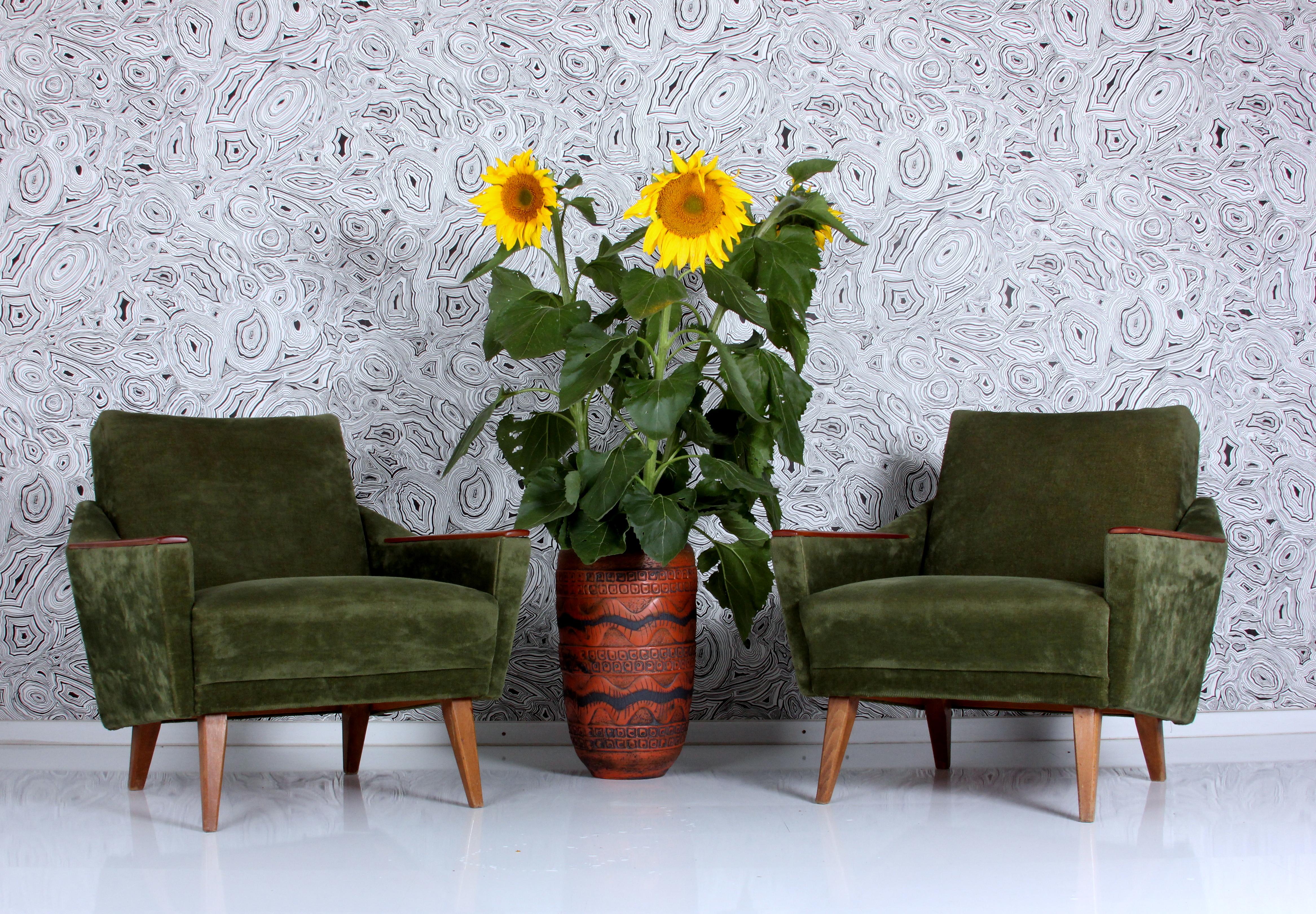 This set of two West German lounge chairs  is in very good condition 
It was made in the mid 1960s 

The armrests have been professionally restored (sanded - stained and lacquered twice in transparent silk)
we subject all our upholstered furniture
