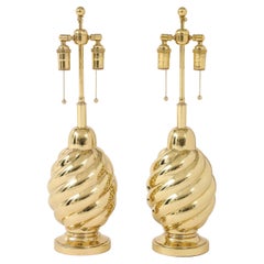 Pair of 1960's Mirror Polished Brass Swirl Lamps by Westwood Industries. Pair of 1960's Mirror Polished Brass Swirl Lamps by Westwood Industries.