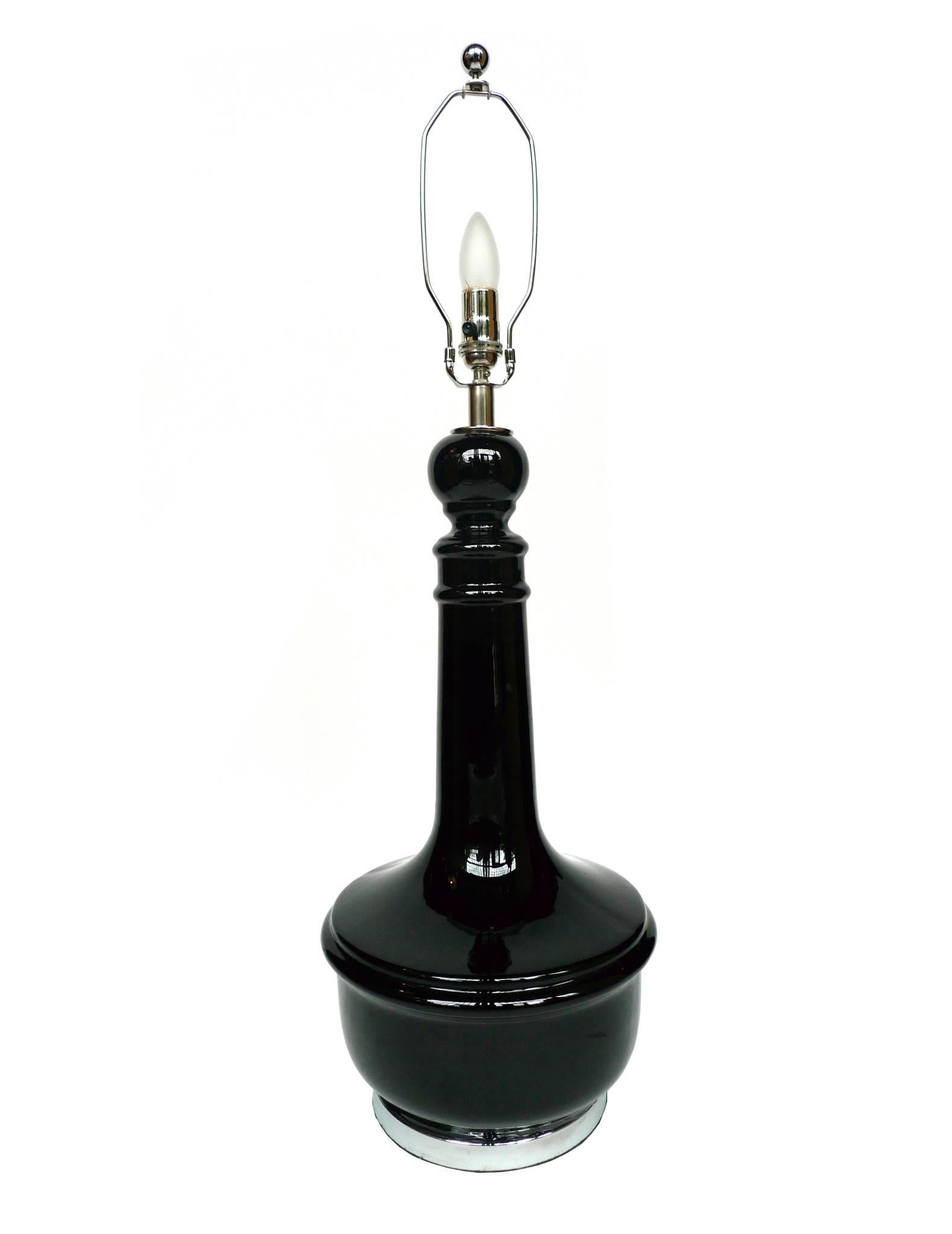 These exquisite Murano lamps have ceramic bodies and chrome bases and hardware. The ceramic is glazed to give the surface a mirror effect, bending the light beautifully. These lamps are newly rewired and refitted with a single medium bulb socket,