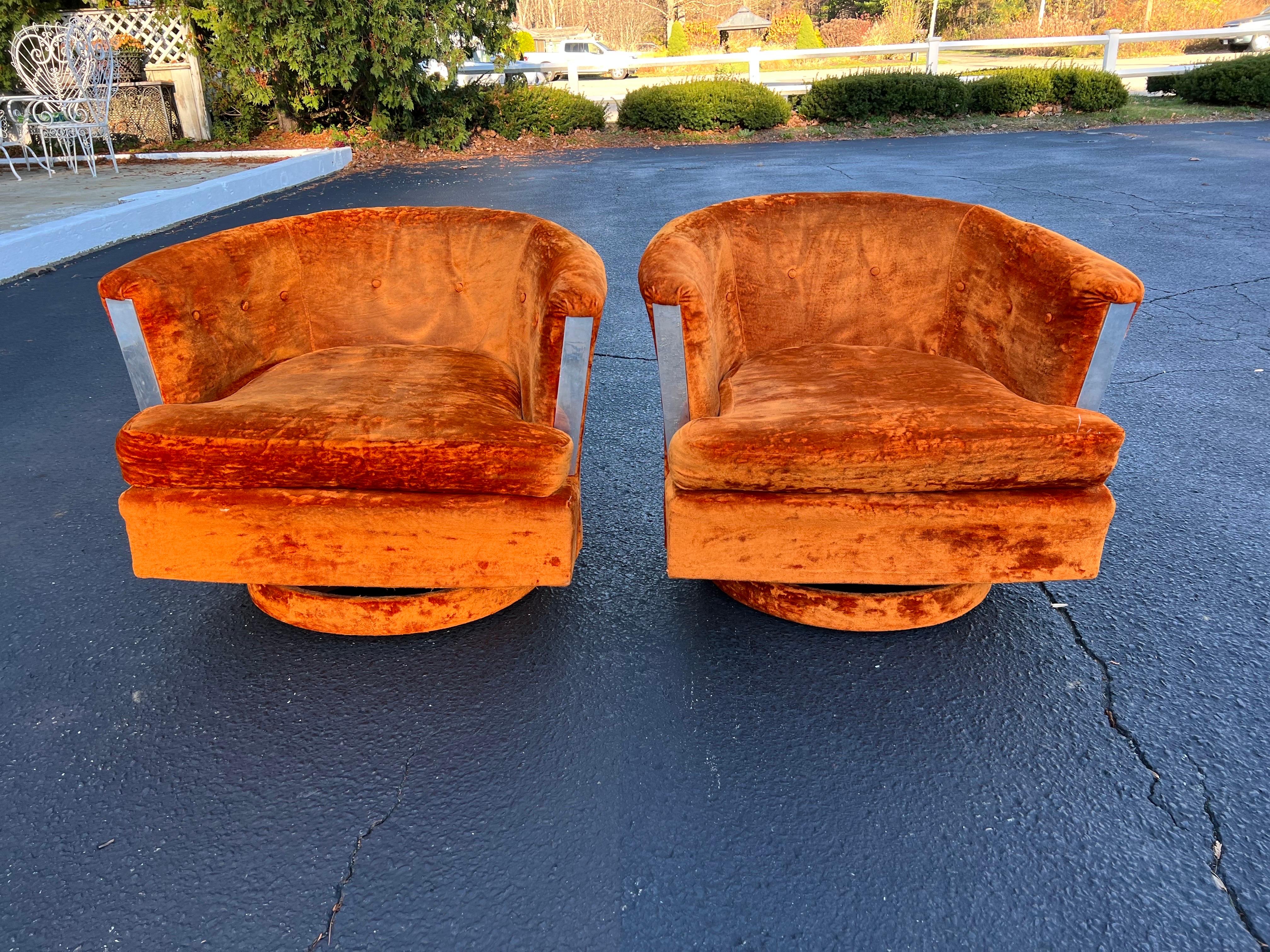 Mid-Century Modern Pair of 1960’s Orange Crushed Velvet Swivel Chairs