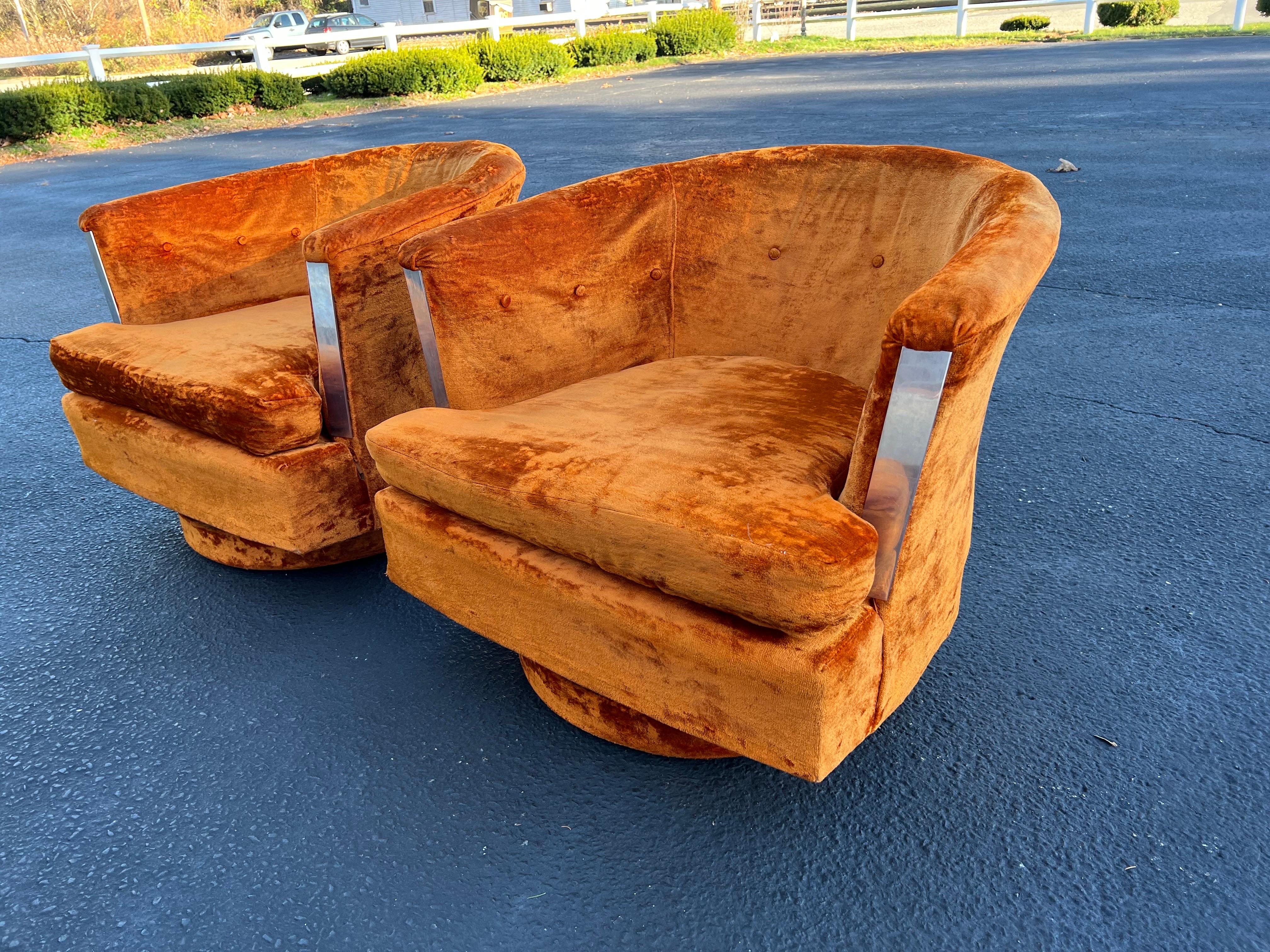 Upholstery Pair of 1960’s Orange Crushed Velvet Swivel Chairs
