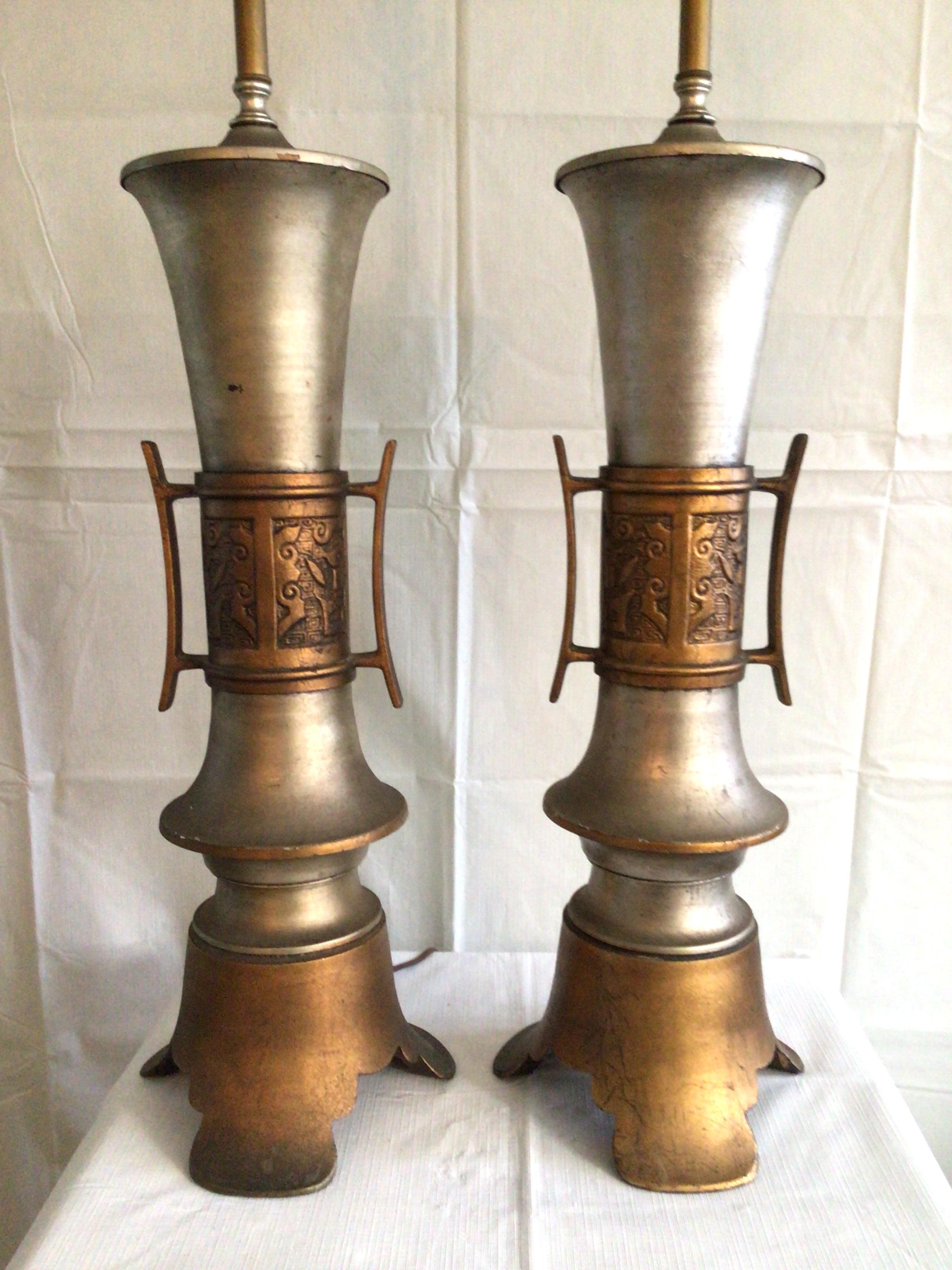 Pair of 1960s painted metal and Asian style lamps.