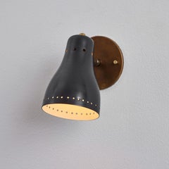 Pair of 1960s Perforated Black Wall Lamps Attributed to Jacques Biny