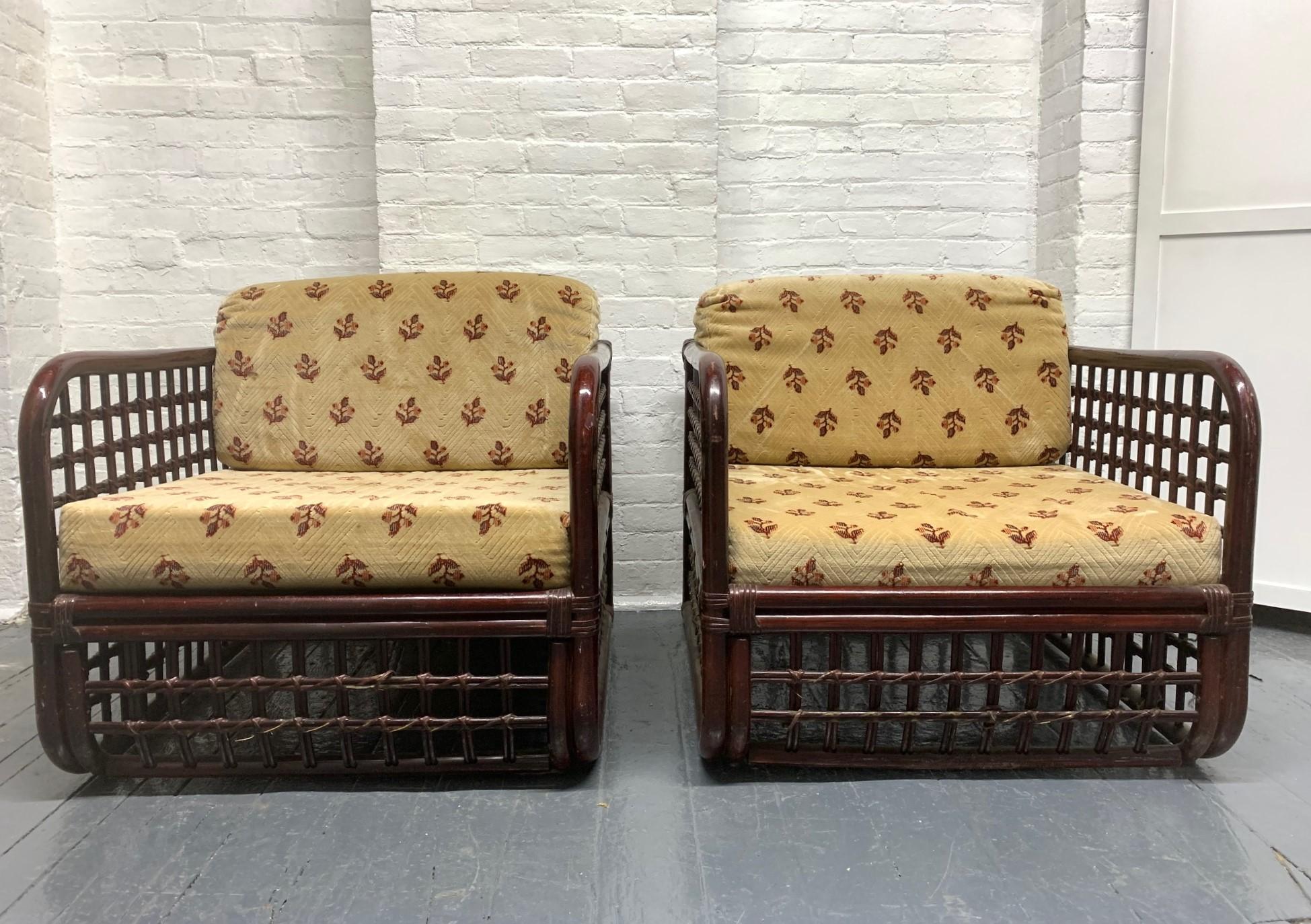 Pair of 1960s rattan lounge chairs. Cubed rattan lounge chairs with the original finish and cushions.