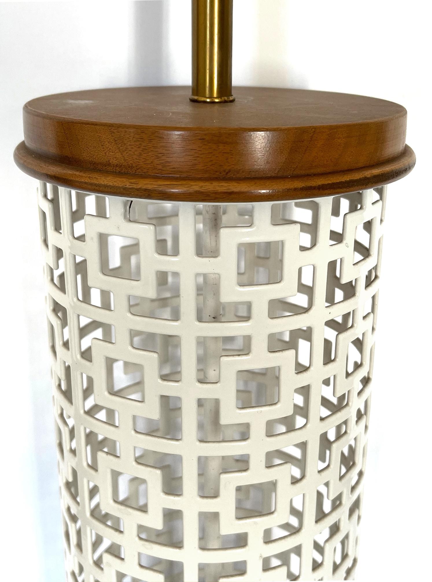 each cylindrical lamp of openwork geometric enameled-metal with wooden caps and bases